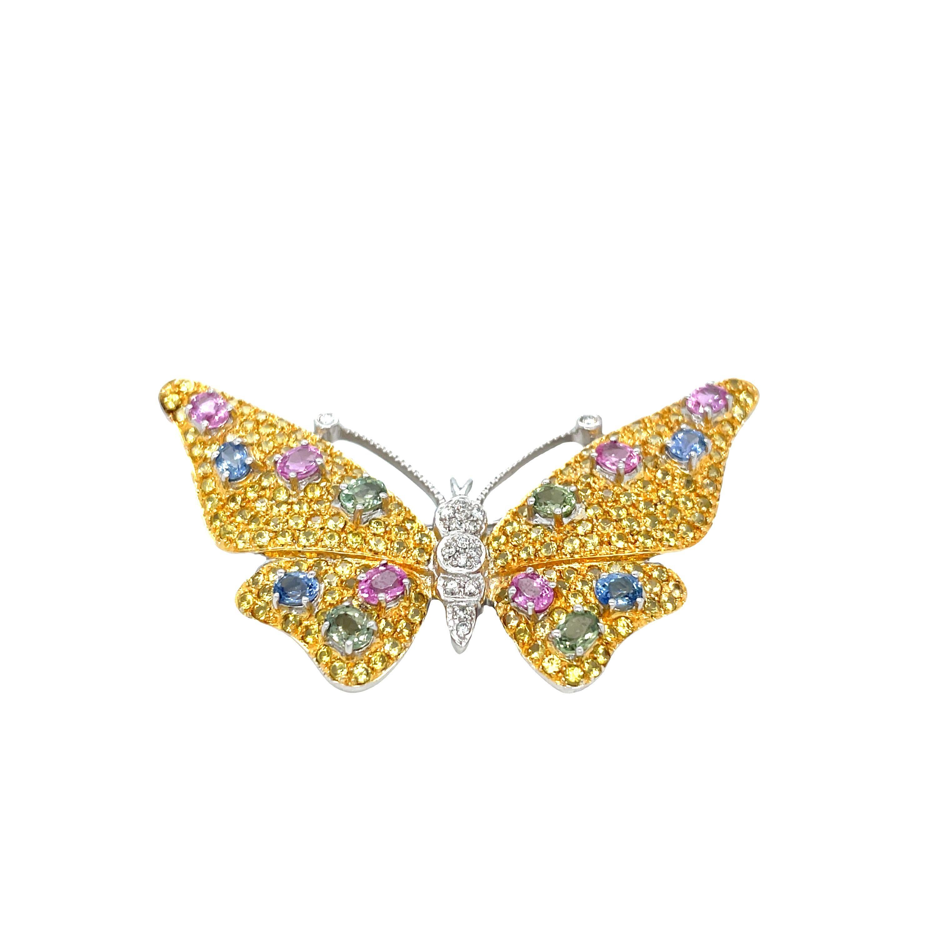 This exquisite piece features colorful sapphires and diamonds, adding elegance and sparkle to your look. A true work of art, this brooch features superb gems totaling 5.5 carats, carefully set in polished 14K white and yellow gold.

The wings of