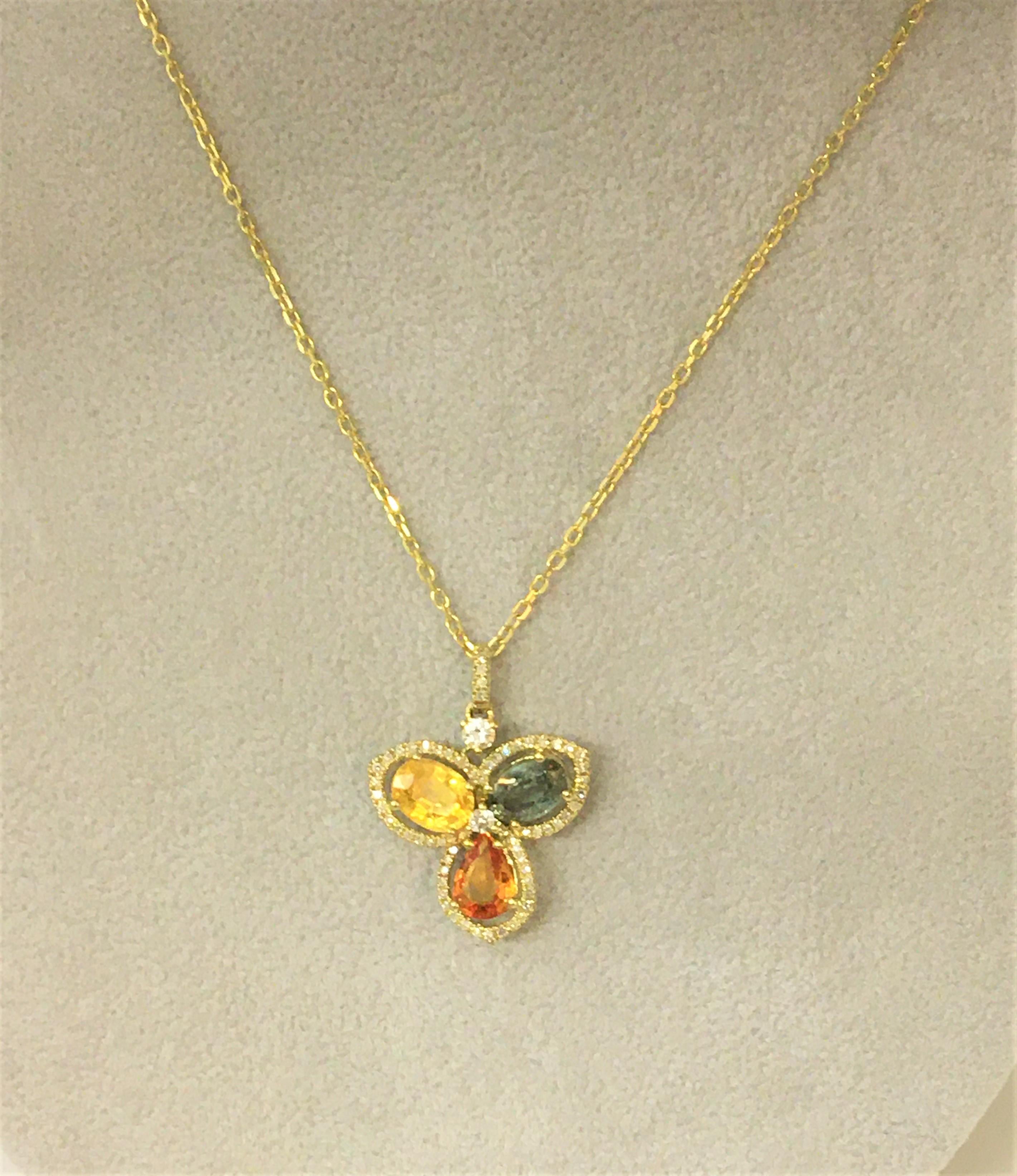 This beautiful piece is perfect for the Fall season and will be great throughout the year with any outfit!
14 karat yellow gold cable chain- 16 inches long.
Three colored sapphires with topaz and diamond details.
Orange, Green and Yellow sapphires -