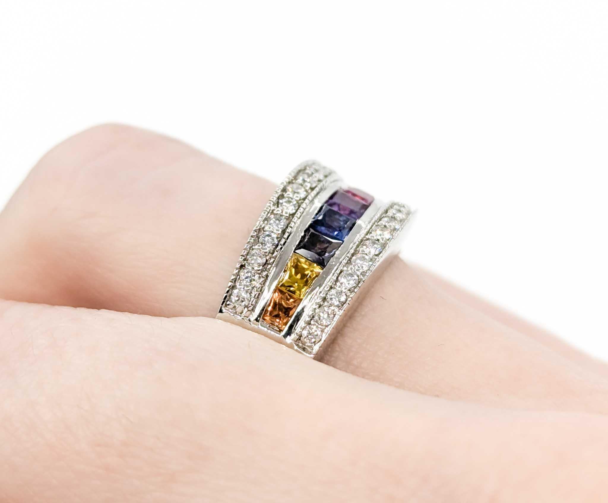 Multi-Color Sapphire & Diamond Ring in White Gold

Introducing this elegant ring crafted in 14k white gold. The ring features .65ctw multi-color channel-set diamonds and .65ctw channel-set synthetic sapphires. The sparkly channel-set diamonds are