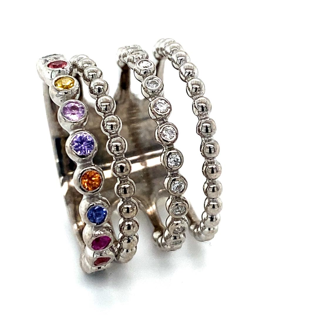 Designer Inspired - on trend Multi Color Sapphire Diamond 14 Karat White Gold Stacked Band 

There are 12 Round Cut Multi Colored Sapphires that weigh approximately a total weight of 0.50 carats and 16 Round Cut Diamonds that weigh 0.17 carats
