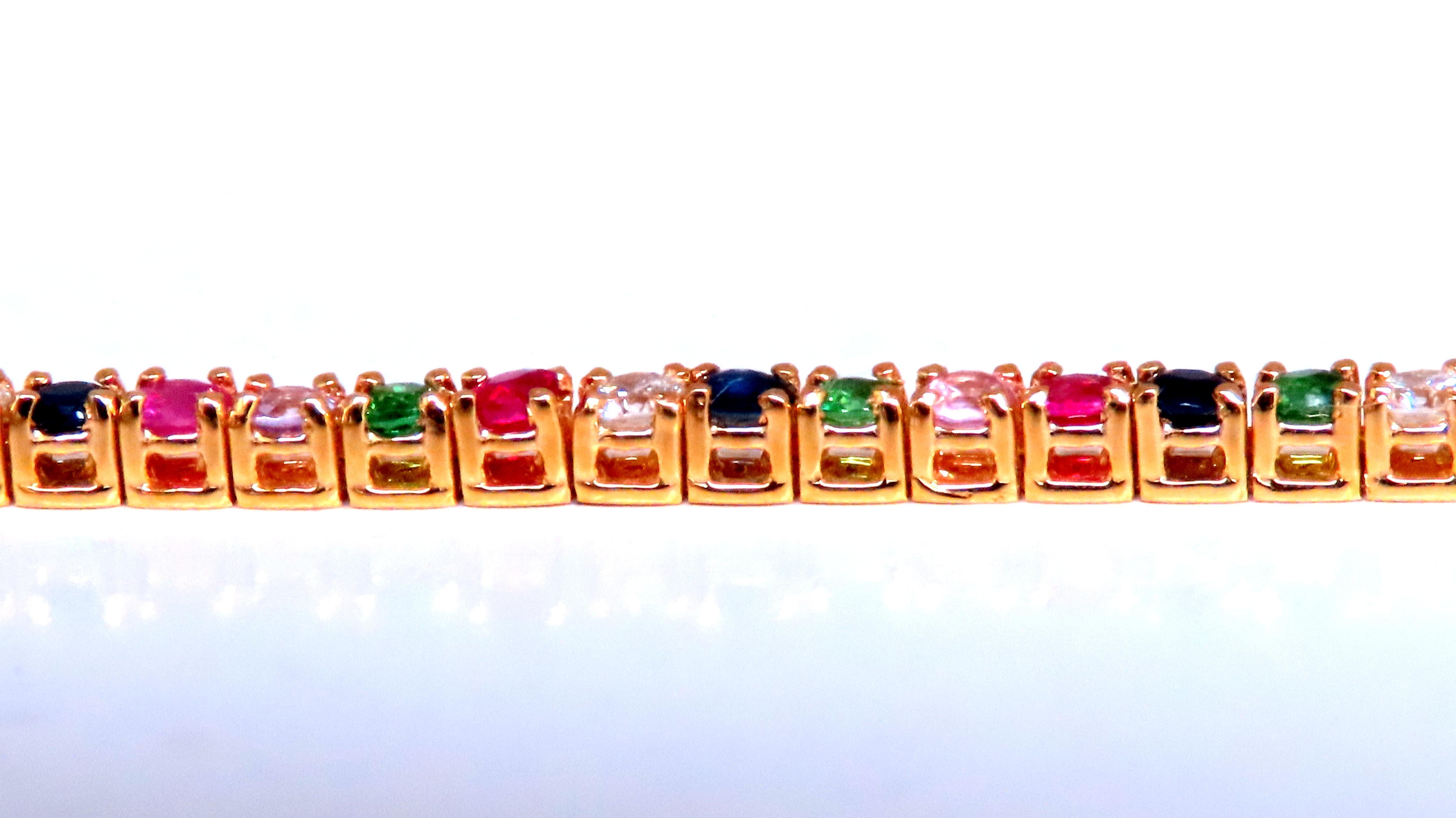 .50ct diamanti naturali a taglio rotondo
colore g/claritàvs 2
.60ct di tzavoriti verdi naturali
.80ct zaffiri blu naturali
.30ct zaffiri rosa naturali 
.50ct rubini naturali rosso/rosa
6 grammi
Oro 14kt tellow
6,25 pollici di lunghezza
2.3 mm di