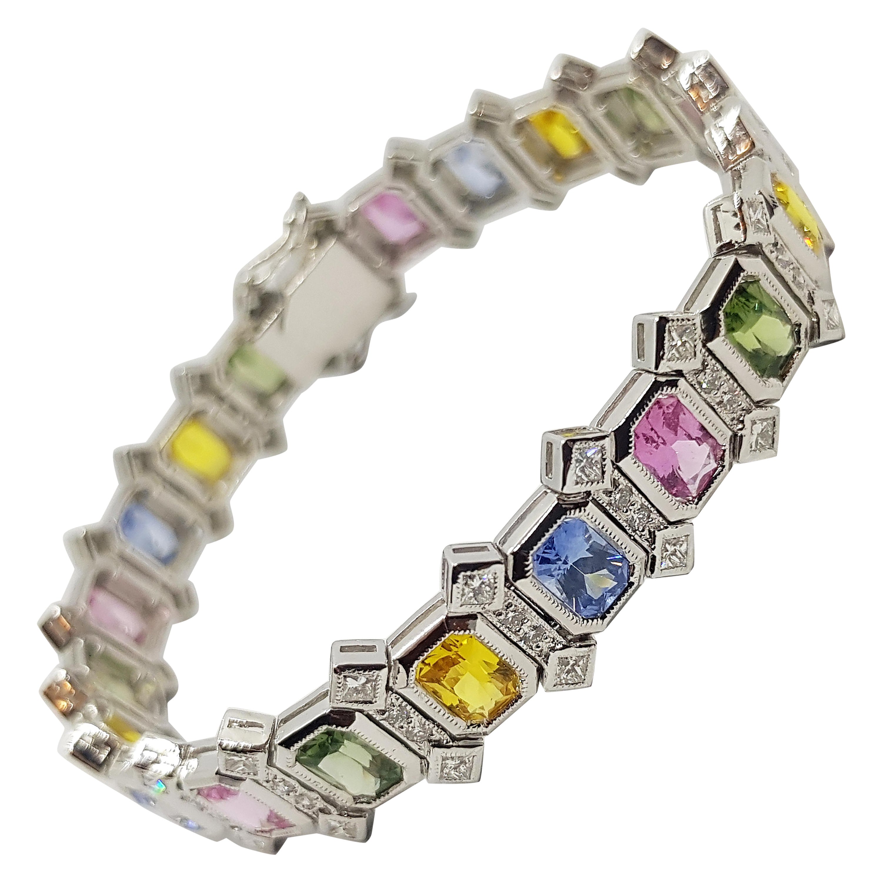 Zaffiro multicolore con diamante incastonato in oro bianco 18 carati