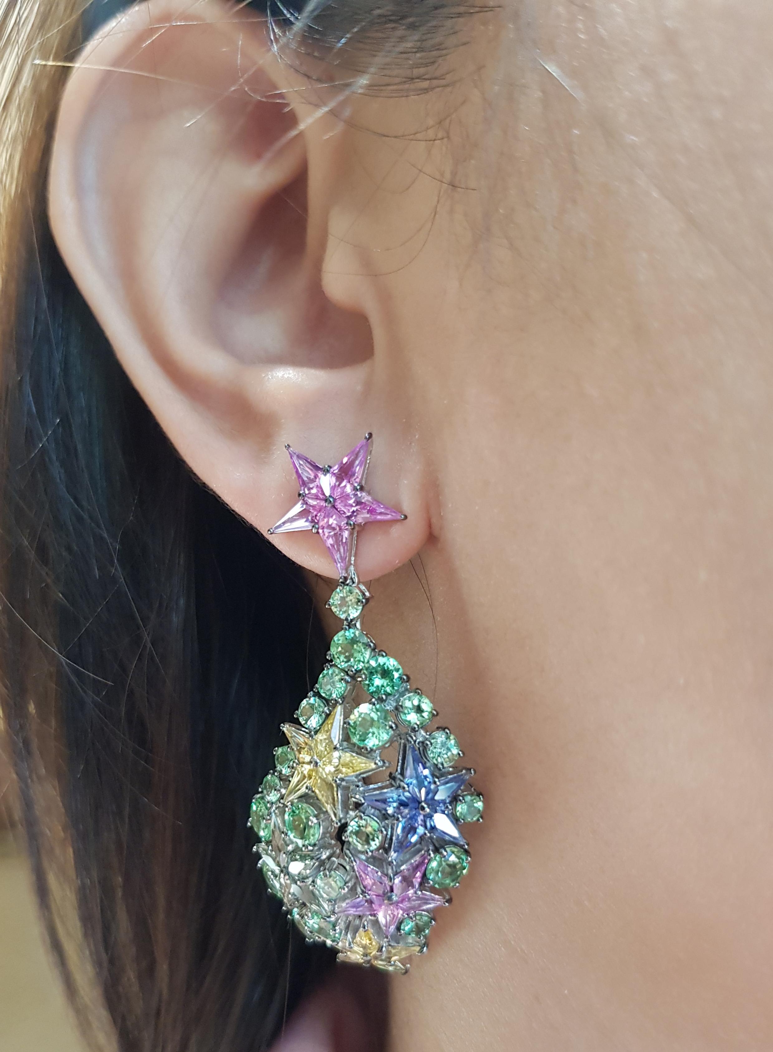 Multi-Color Sapphire 9.17 carats with Tsavorite 7.47 carats Earrings set in 18 Karat White Gold Settings

Width:  2.7 cm 
Length: 5.6 cm
Total Weight: 24.06 grams

