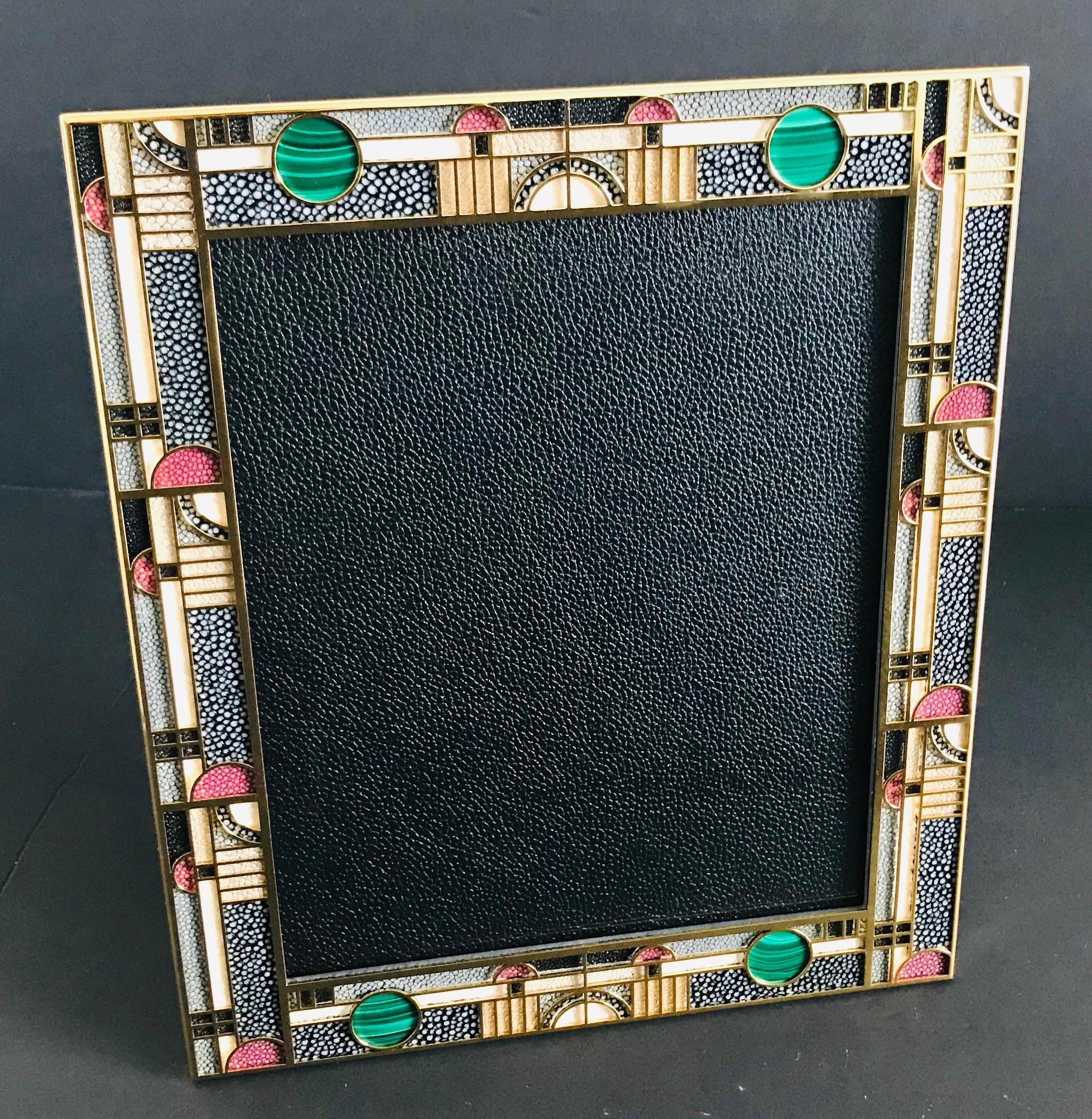Multi-color shagreen with malachite inserts and gold-plated picture frame by Fabio Ltd
Height: 12 inches / Width: 10.25 inches / Depth: 1 inch
Photo size: 8 inches by 10 inches
1 in stock in Palm Springs
Order Reference #: FABIOLTD PF45
This piece