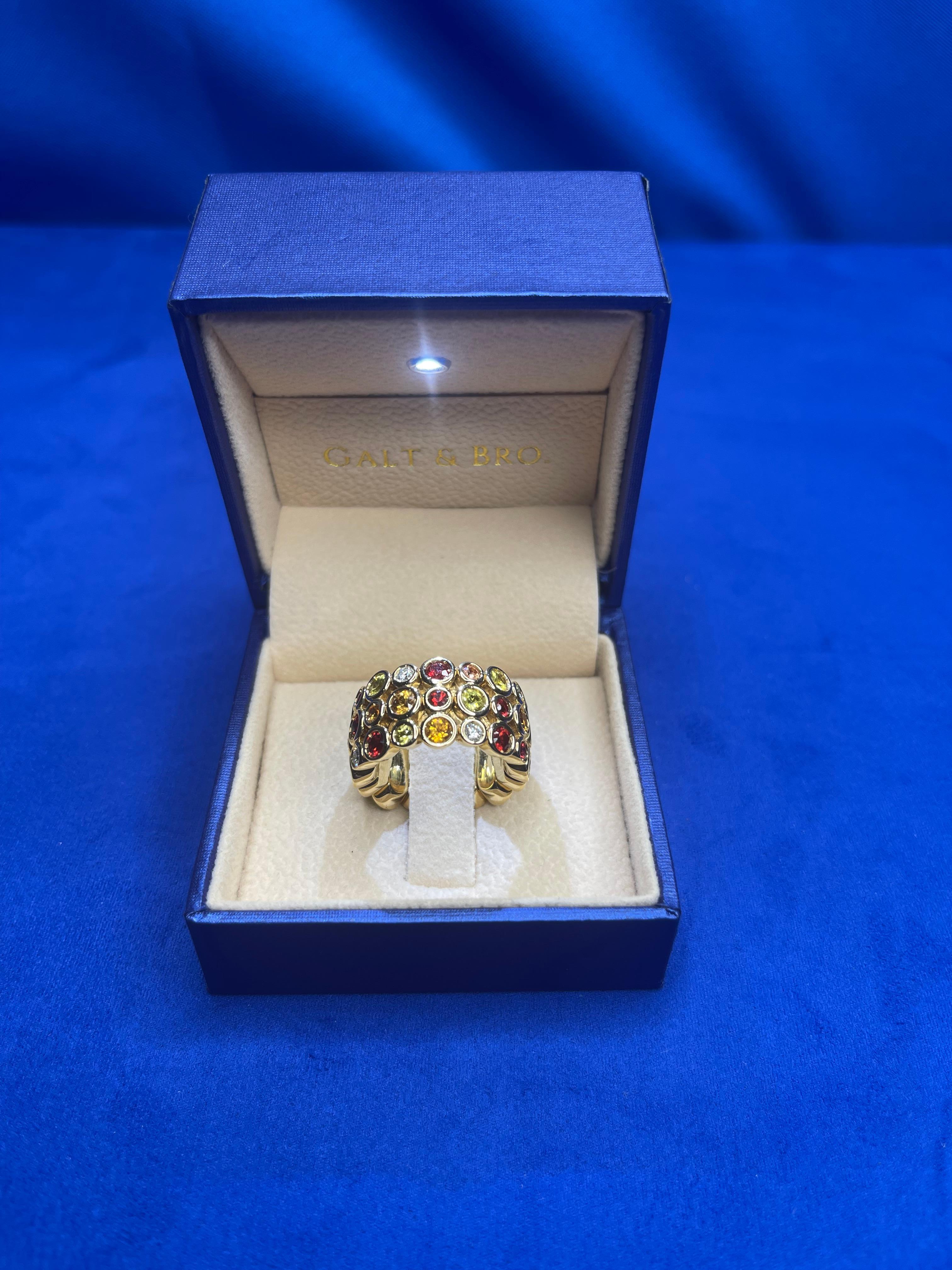 Brilliant Cut Red Ruby Orange Yellow Sapphire Diamond Eternity Band 18 Karat Yellow Gold Ring For Sale