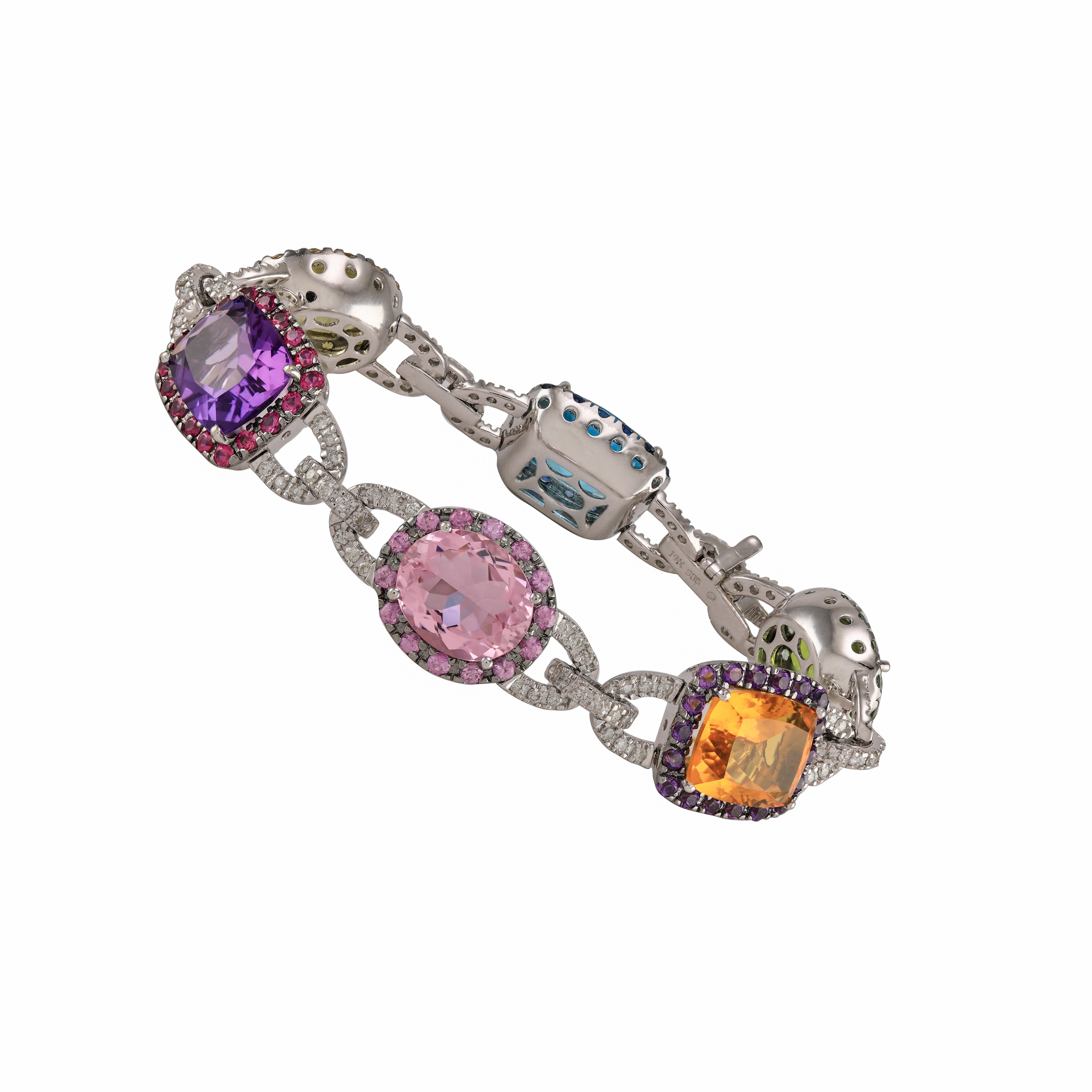 Topaze multicolore, Topaze bleue, Améthyste, Topaze verte, Topaze jaune, Bracelet de tennis 14k avec diamant

Un magnifique bracelet plein de vie et de couleurs. Ce magnifique bracelet se mariera à coup sûr avec n'importe quelle tenue vestimentaire.