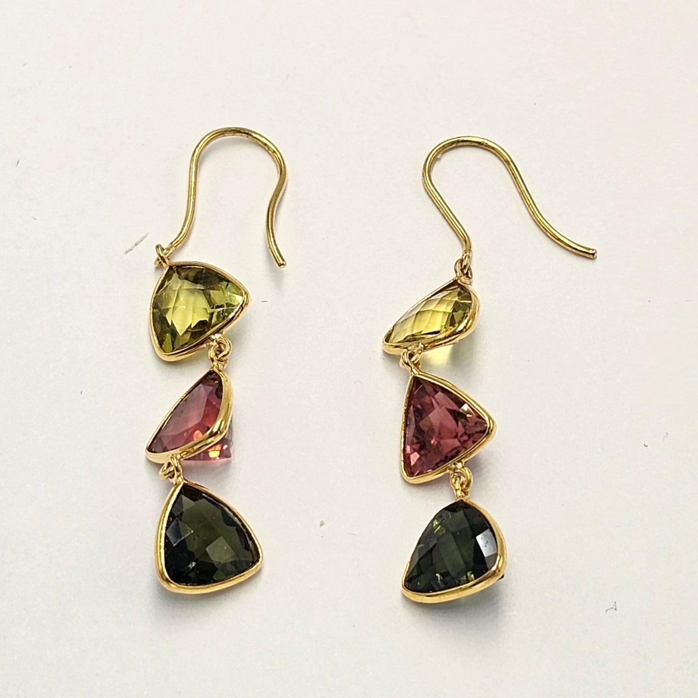 Hand crafted with hand picked beautiful Multi Color tourmaline as there center stones, this pair of earrings is perfect for every occasion and has a blend of modern and classic style! With our in house manufacturing of jewelry and cutting and