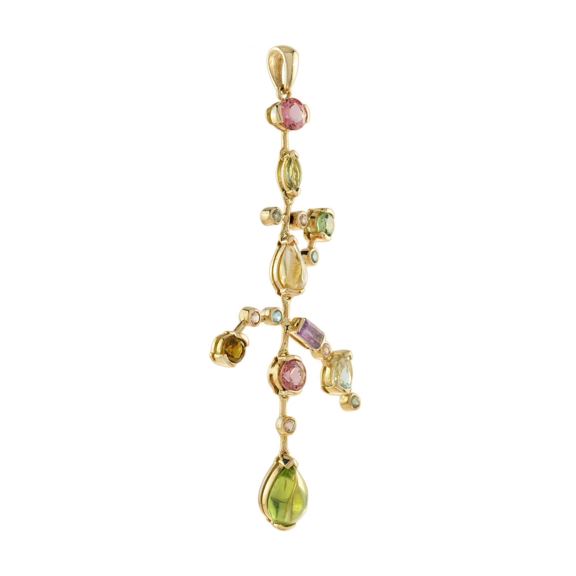 A stunning one-of-a-kind multi-colored pendant made up of tourmaline, peridot, and citrine.
These little droplets of color move and capture the light as the pendant is worn. Wear on your favorite chain for a statement look.

Information
Metal: 14K