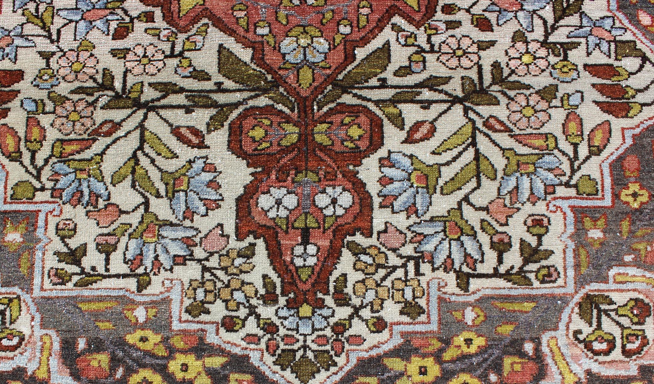 Wool Multi-Colored and Ivory Antique Persian Bakhtiari Rug with Floral Medallion For Sale