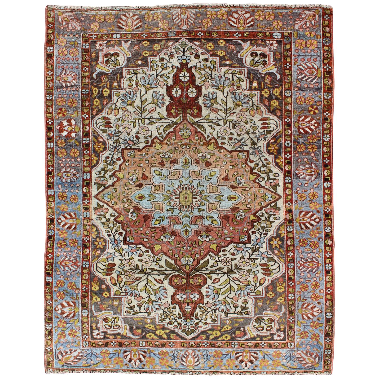 Multi-Colored and Ivory Antique Persian Bakhtiari Rug with Floral Medallion For Sale