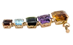 Multi-Colored Emerald Cut Gemstone Banner Brooch Set in 14 Karat Yellow Gold