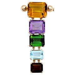 Multi-Colored Emerald Cut Gemstone Banner Brooch Set in 14 Karat Yellow Gold
