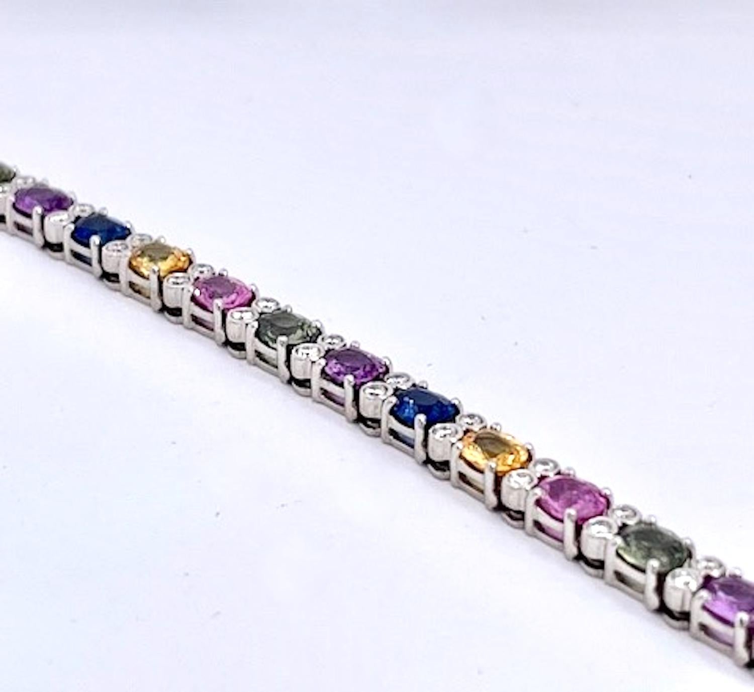 This Multi Colored Sapphire and Diamond Bracelet goes beautifully with the multi colored sapphire long chain and the tassel earrings in another listing. I just love fancy colored Sapphires as the number of colors they come in is just astounding!  I