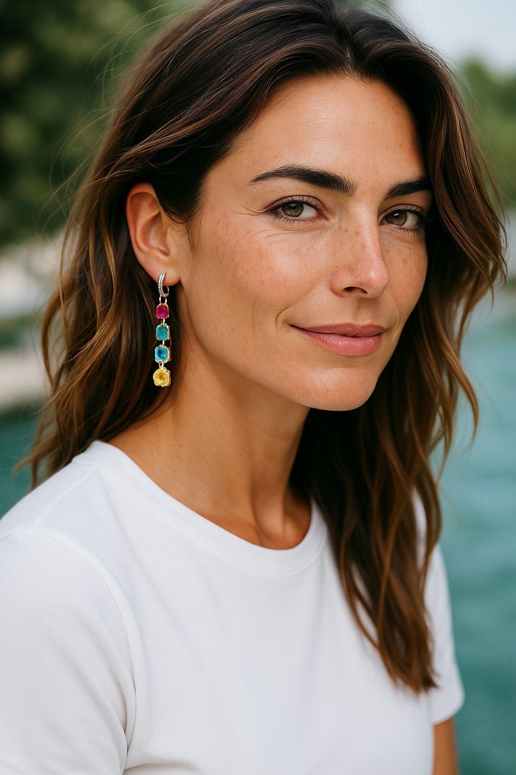 Introducing our stunning 14 Karat Yellow Gold Multi-Colored Gemstone and Diamond Hoop Earrings, designed to captivate with their exquisite beauty and vibrant hues. These breathtaking earrings feature a delicate hoop design crafted from luxurious 14