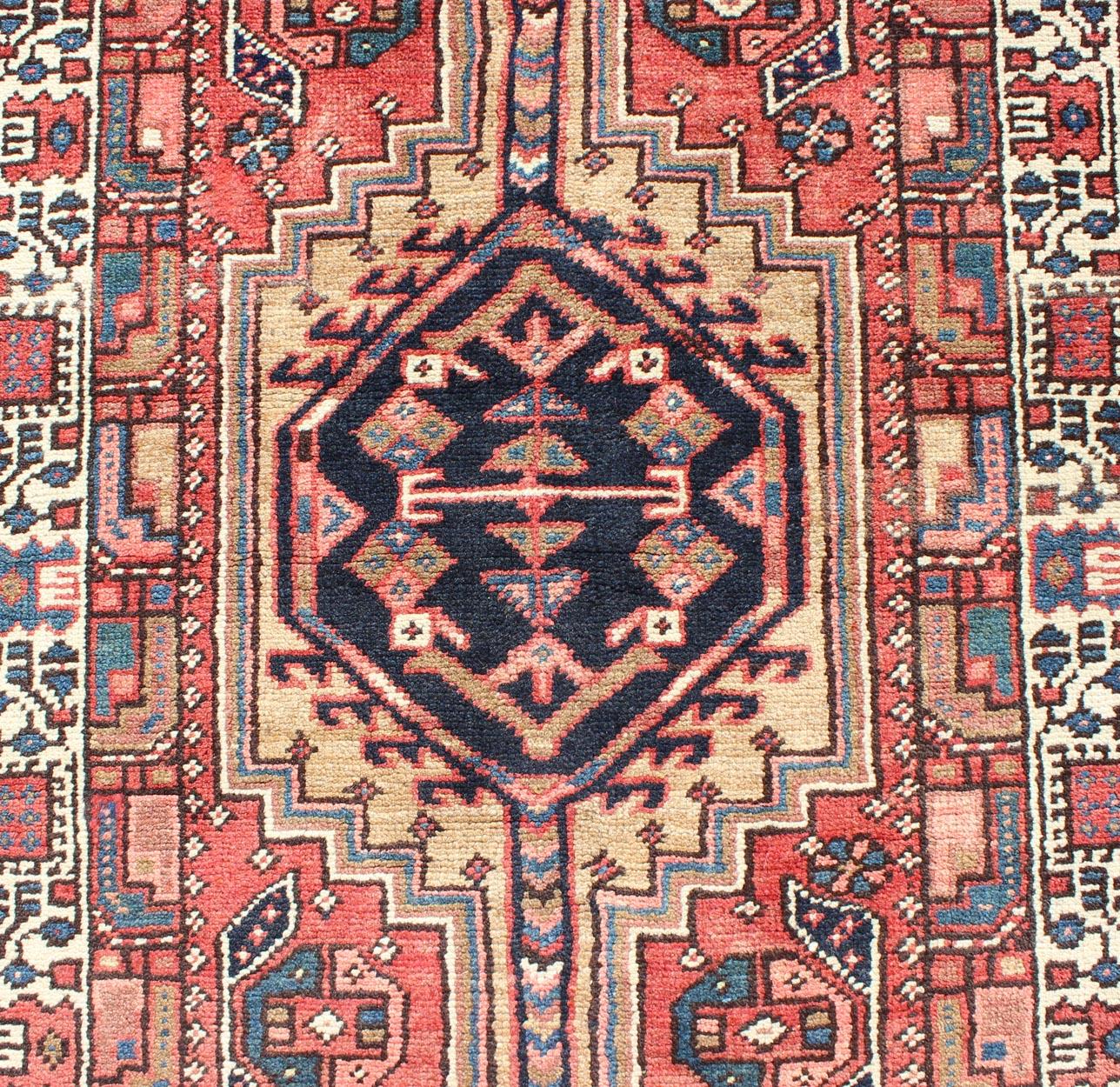 Early 20th Century Geometric Antique Persian Heriz Runner with Six Medallions in Light tones For Sale