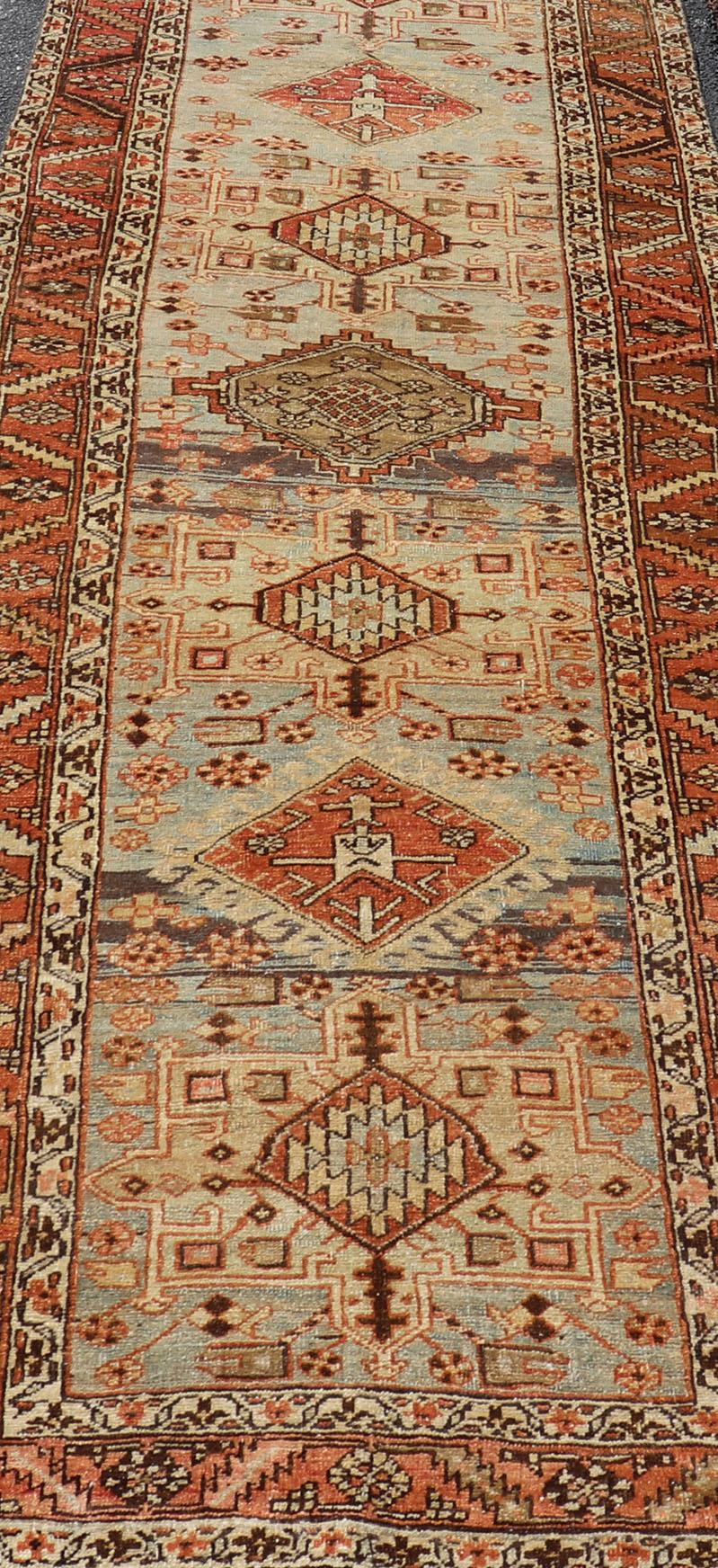 20th Century Multi Colored Long Antique Persian Heriz Runner with Geometric Medallions For Sale