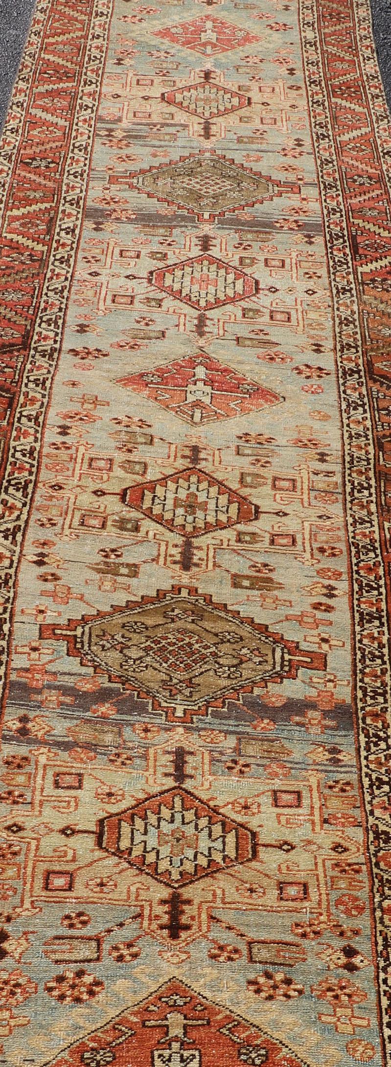 Wool Multi Colored Long Antique Persian Heriz Runner with Geometric Medallions For Sale