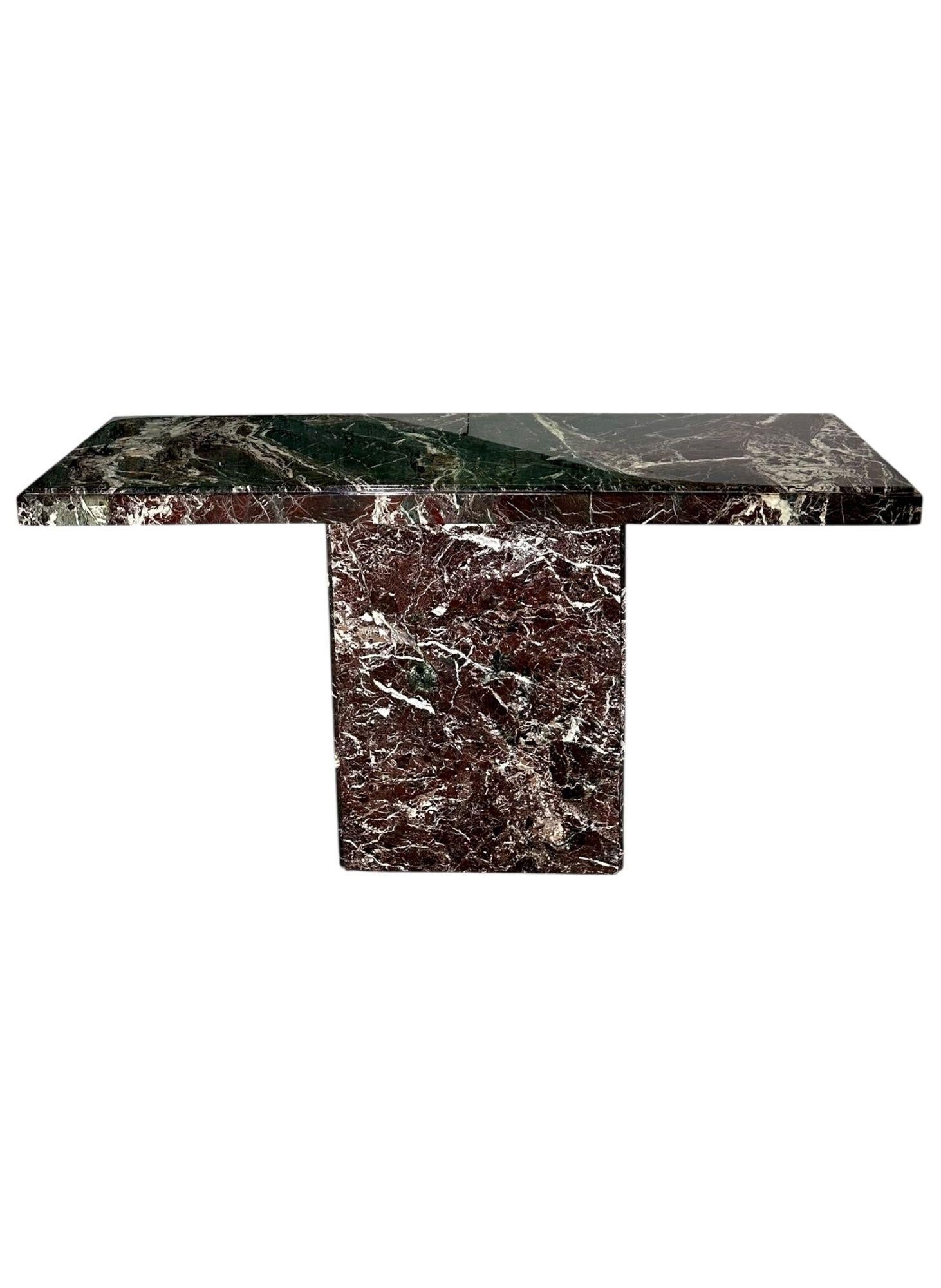Multi Colored Marble Console Table, Italy 1970s.
Measures 29.5” tall 55.25” long 16” wide