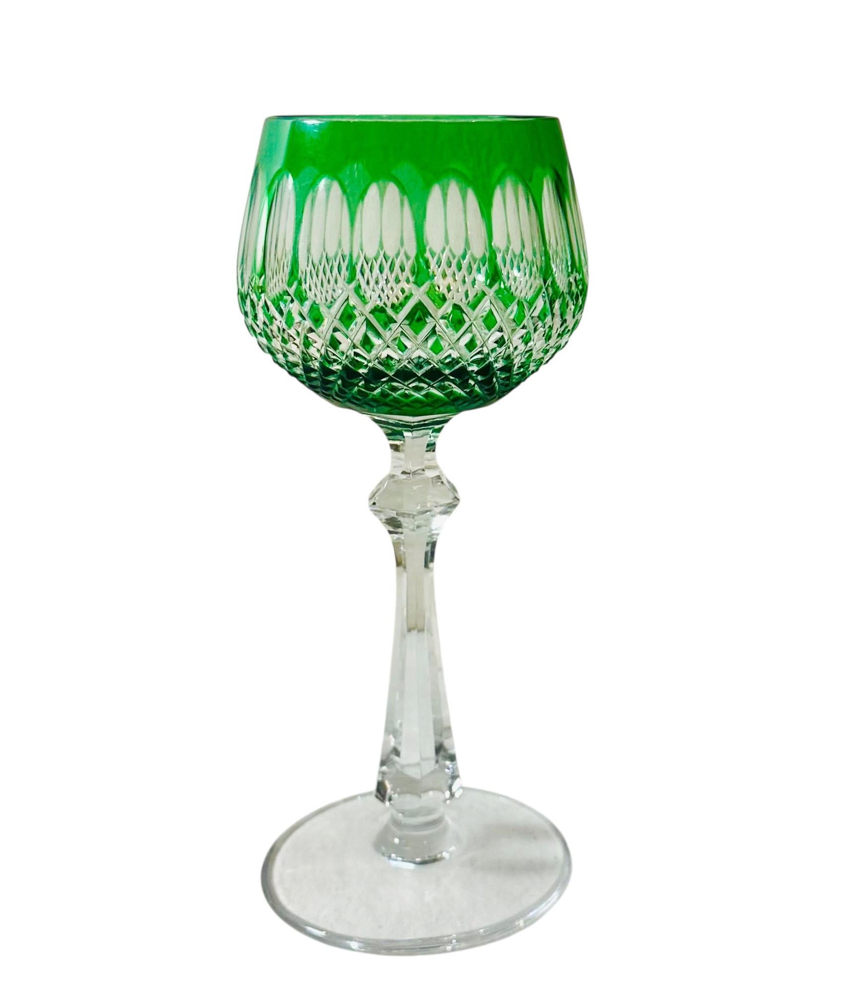 Beautiful set of eight handblown Mosher glass stems in a vibrant mix of colors including two pink, one purple, two blue, one green, and one deep burgundy. Each glass showcases Mosher’s signature quality and rich color clarity.

Likely dating from