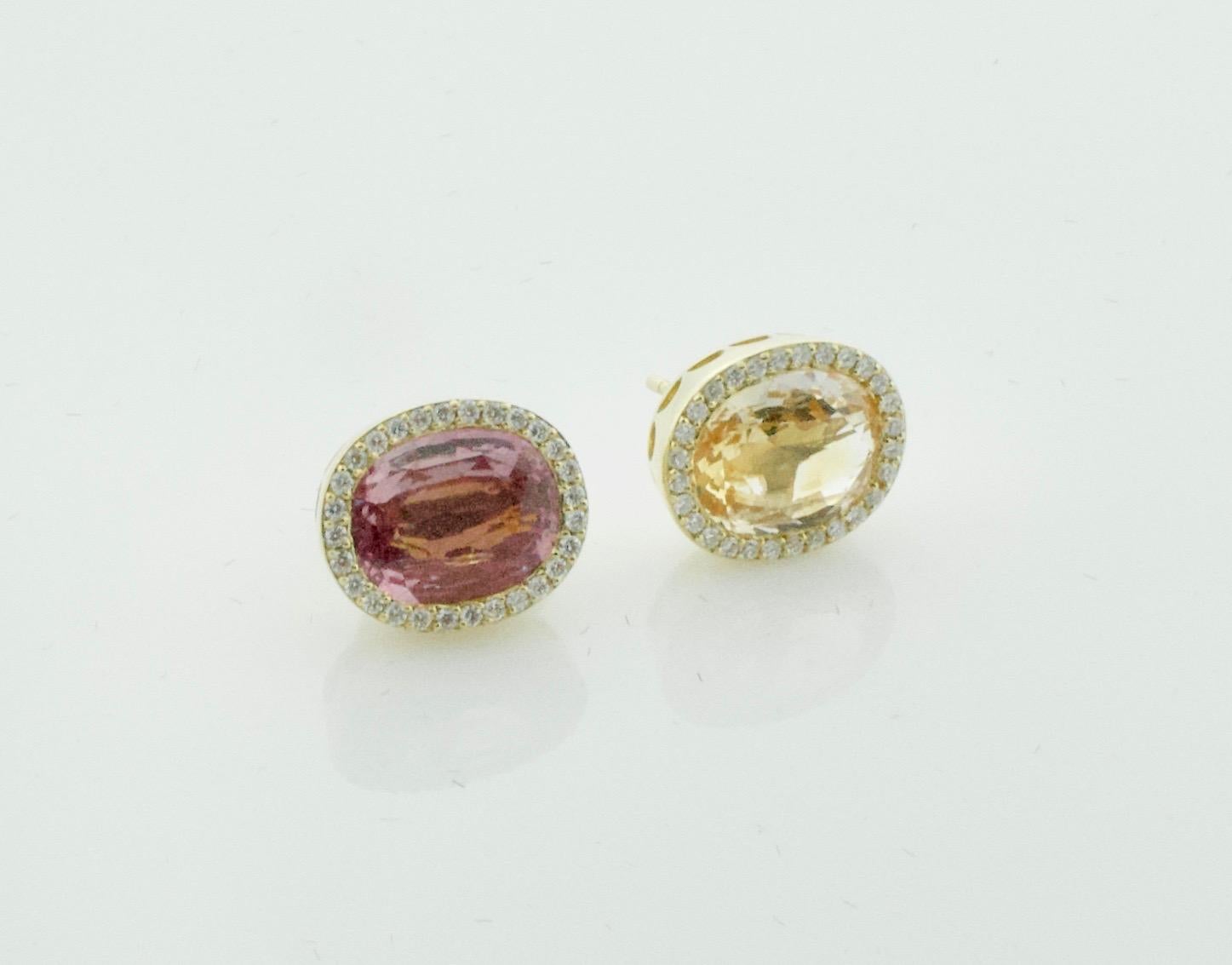 Multi Colored Sapphire and Diamond Earrings in 18k Yellow Gold
Your Eyes Are Not Playing Tricks
These Earrings Have Different Colored Sapphire on Each Ear
One Oval Cut Pink sapphire Weighing 3.00 Carts Approximately   
One Oval Cut Golden sapphire