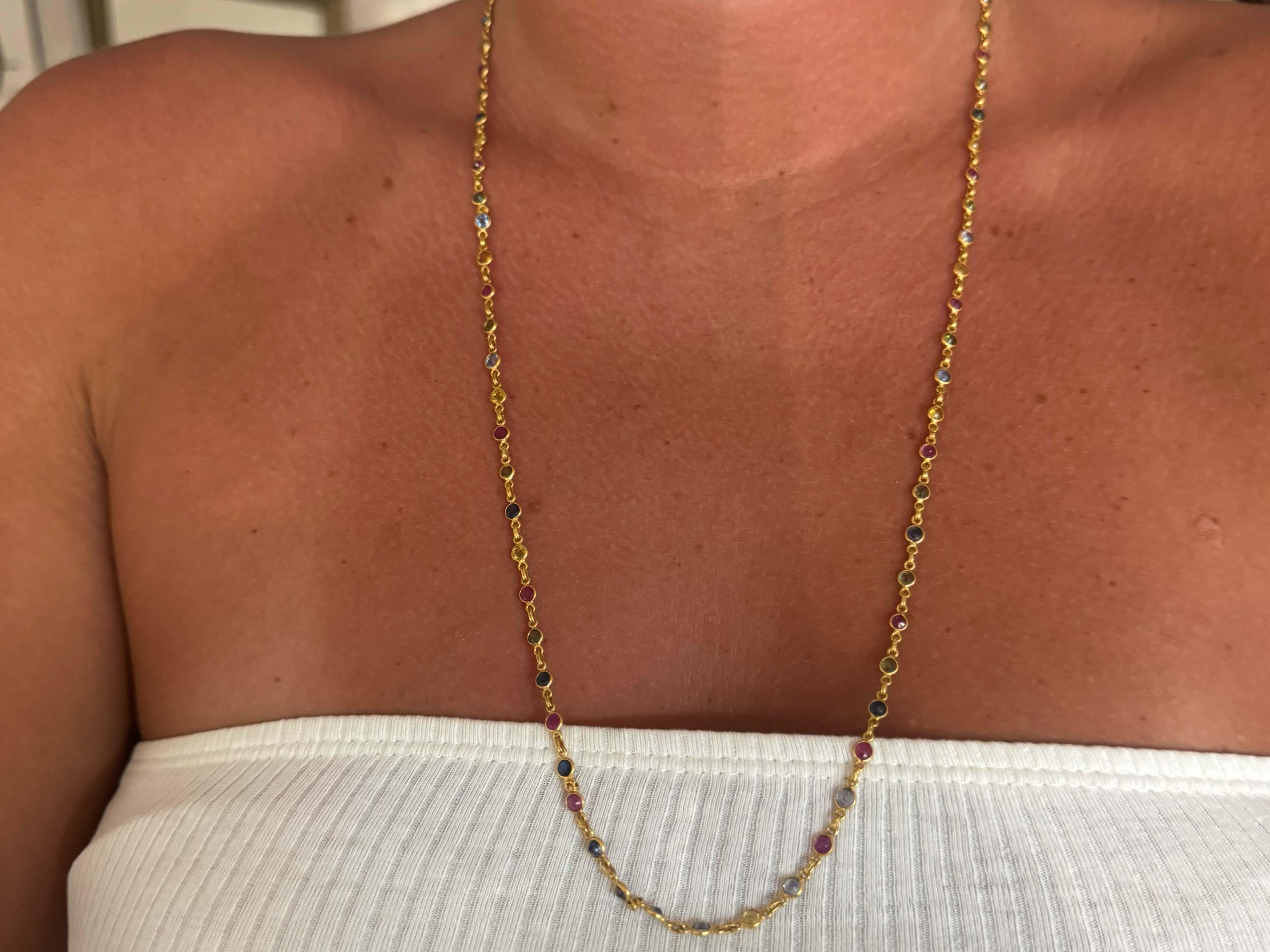 Necklace Specifications:

Style: Necklace by the Yard

Metal: 22k Yellow Gold

Total Weight: 13.9 grams

Sapphire and Ruby Diameter: ~3.4 mm each

Sapphire and Ruby Total Count: 78

Sapphire and Ruby Total Carat Weight: ~10.00 carats

Sapphire and