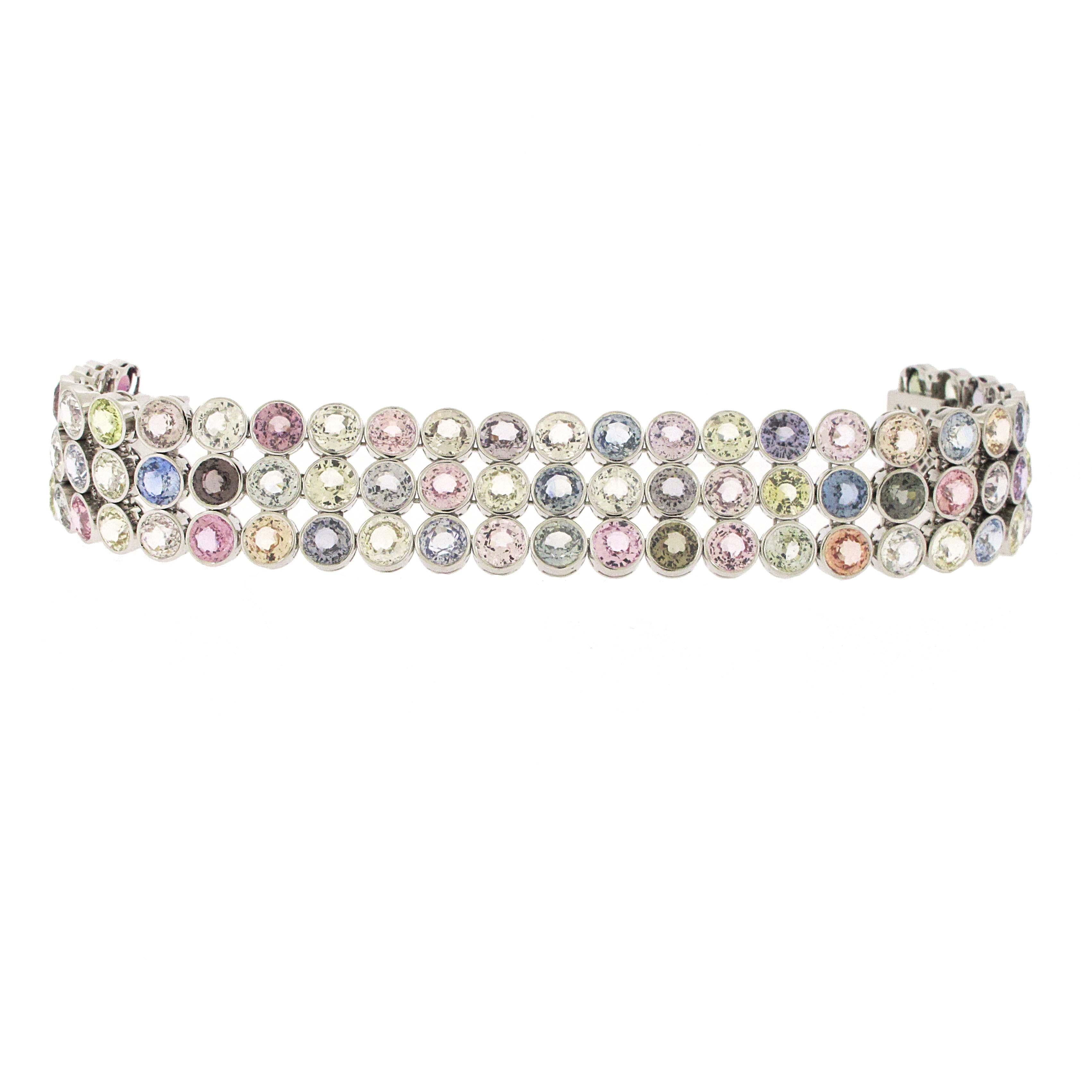 Pastel colored sapphires are all the rage! This bracelet has over 58 carats of multi-colored sapphires ranging from blues to greens to pinks. This is an extremely unique bracelet and another cannot be had. Round cut sapphires are the hardest to find