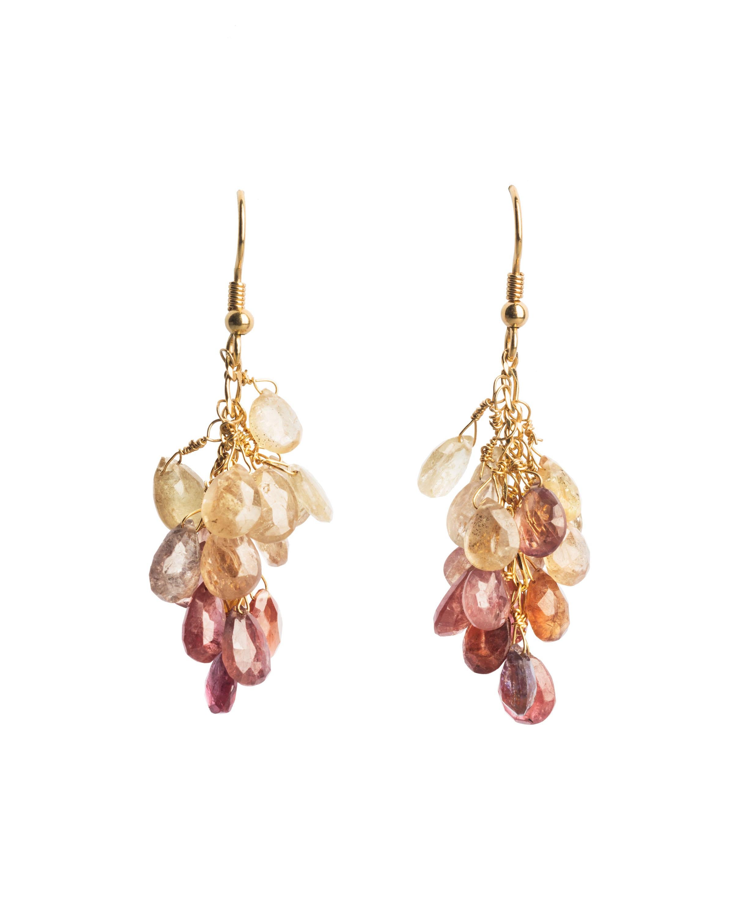 Jane Magon Collections Bohemian Chic Drop Dangles Earrings with cascading Sapphires in shades of Pink and Yellow all wire wrapped in 18kt Yellow Gold. Shepards Hoop for pierced ears. 
