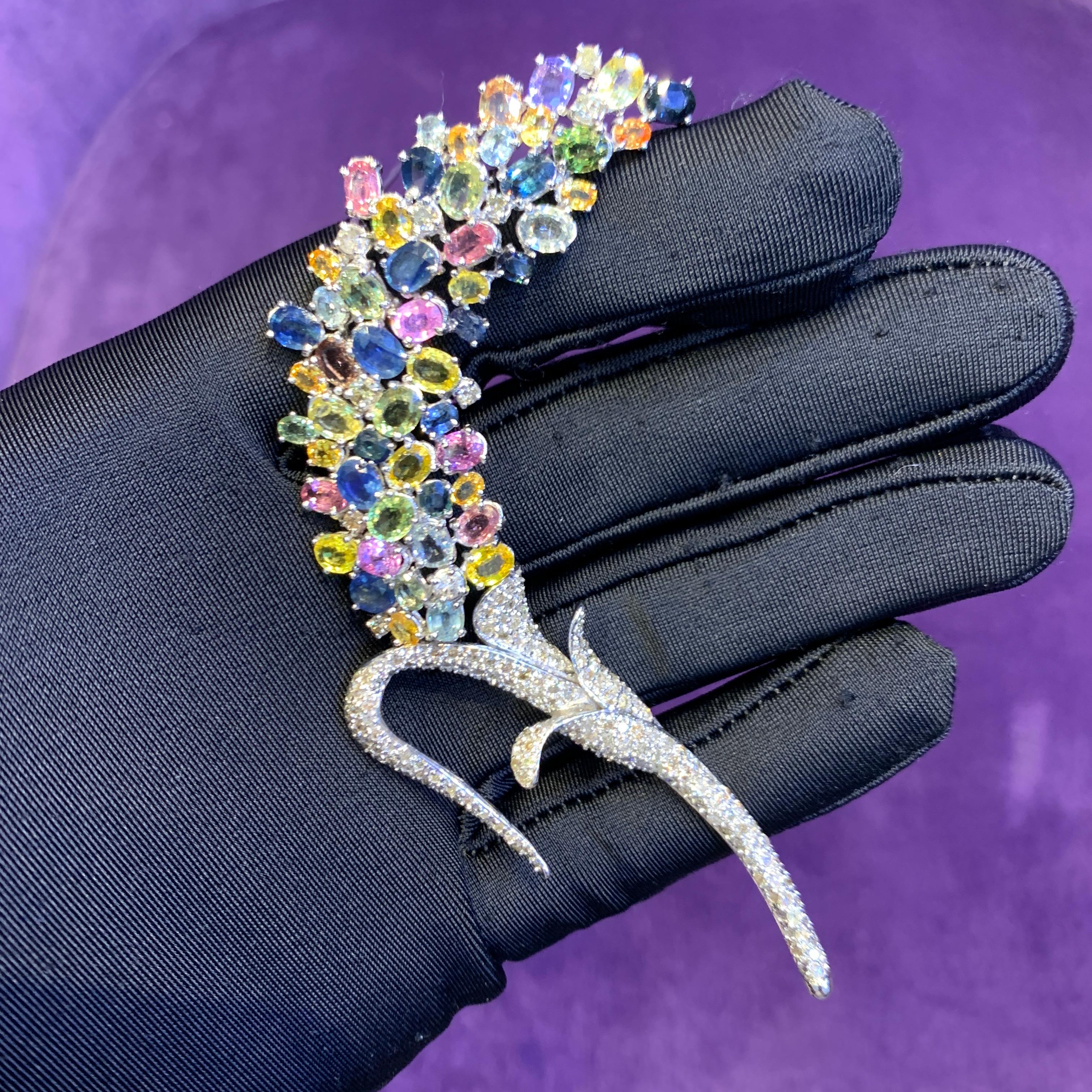 Multi Colored Sapphire Flower Brooch

An 18 karat white gold brooch with a floral motif set with oval shaped sapphires of various colors 

Measurements: 4