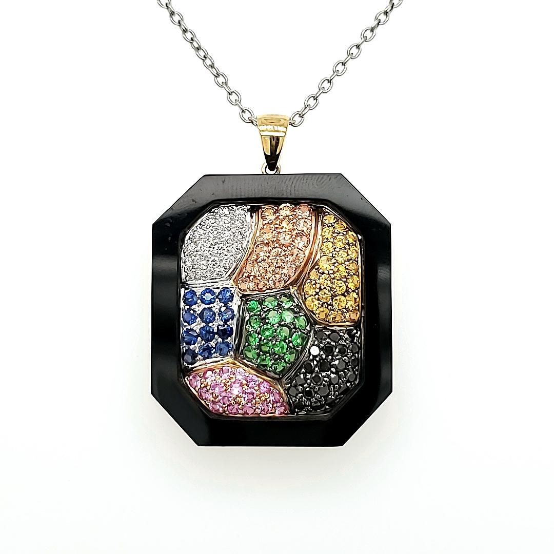 Multi-Colored Sapphire, Tsavorite and Diamond Necklace in a Black Jade Ornamenta
This extraordinary necklace features an excellent black jade ornamental case that beautifully encompasses the allure of multi-colored sapphires, diamonds, and
