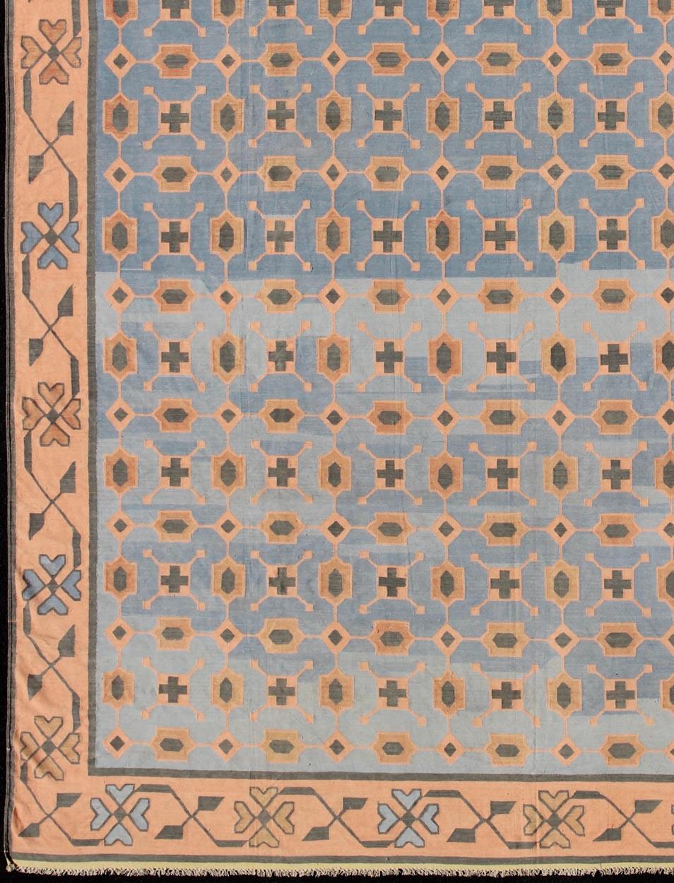 Colorful vintage Indian Dhurrie with small scale geometric design, rug 19-0504, country of origin / type: India / Dhurrie, circa 1960

Woven during the second half of the 20th century, this designer flat-woven Indian cotton dhurrie is decorated