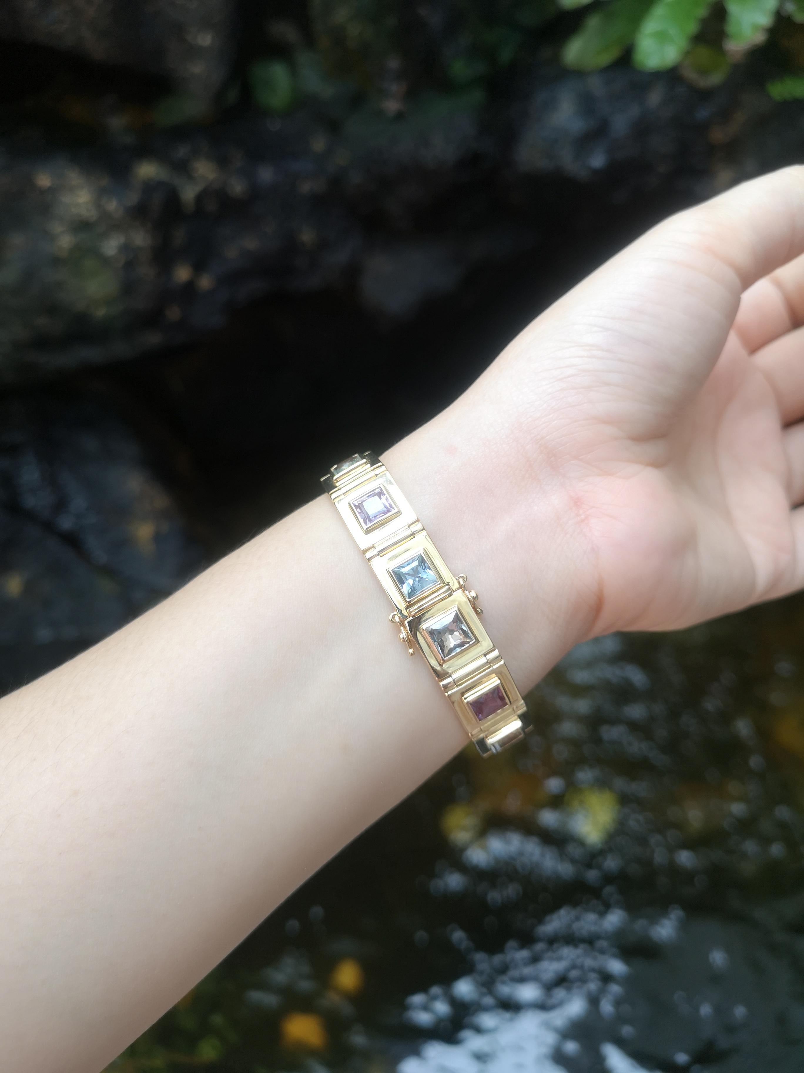 Multi Colour Sapphire 16.98 carats Bracelet set in 18 Karat Gold Settings 

Width:  1.3 cm 
Length: 17.8 cm
Total Weight: 60.54 grams

