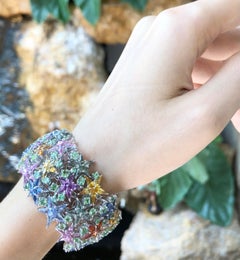 Bracciale a stella con zaffiro multicolore e tsavorite in oro bianco 18 carati