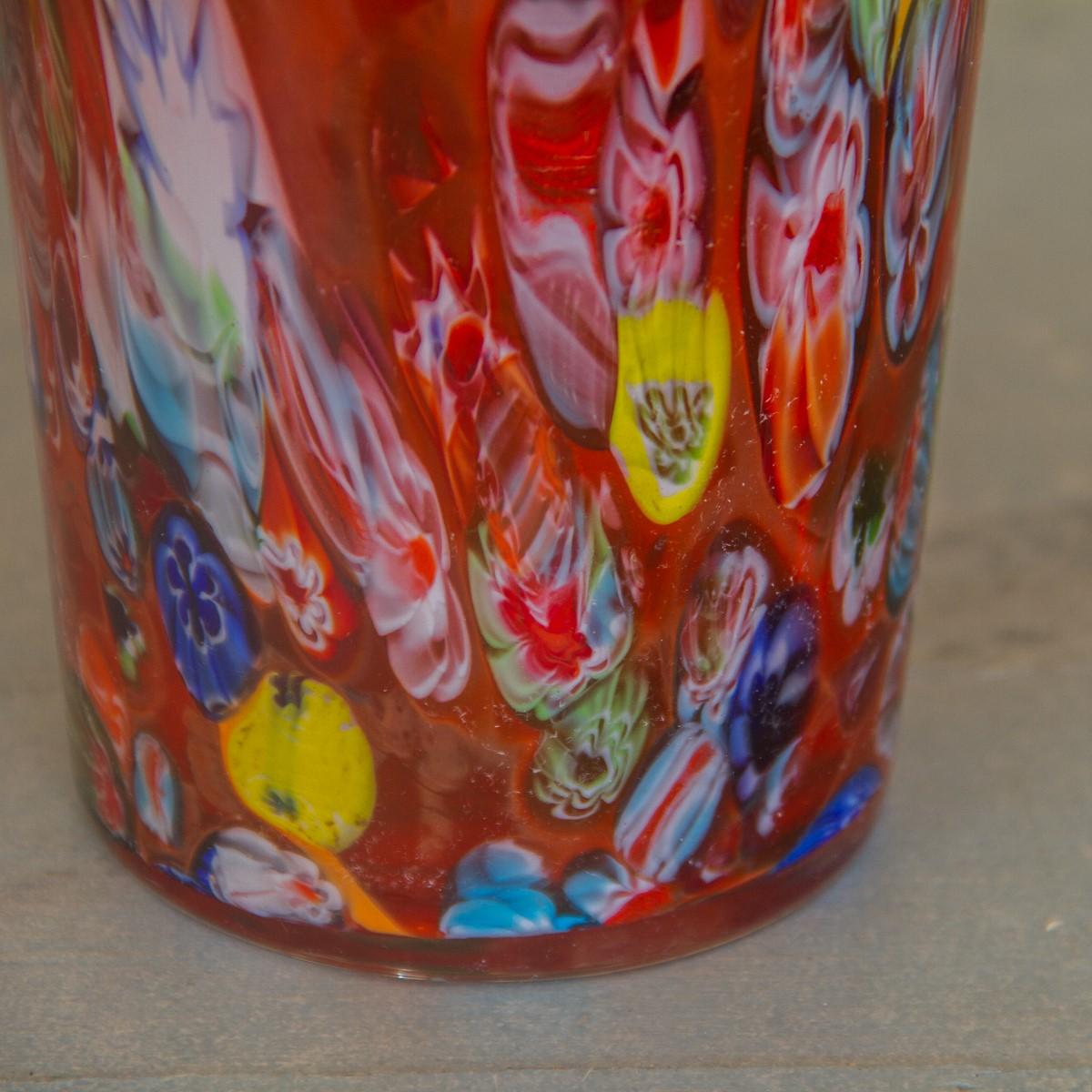 A large red and multicolored Millefiori glass vase. The term Millefiori is a combination of the Italian words 