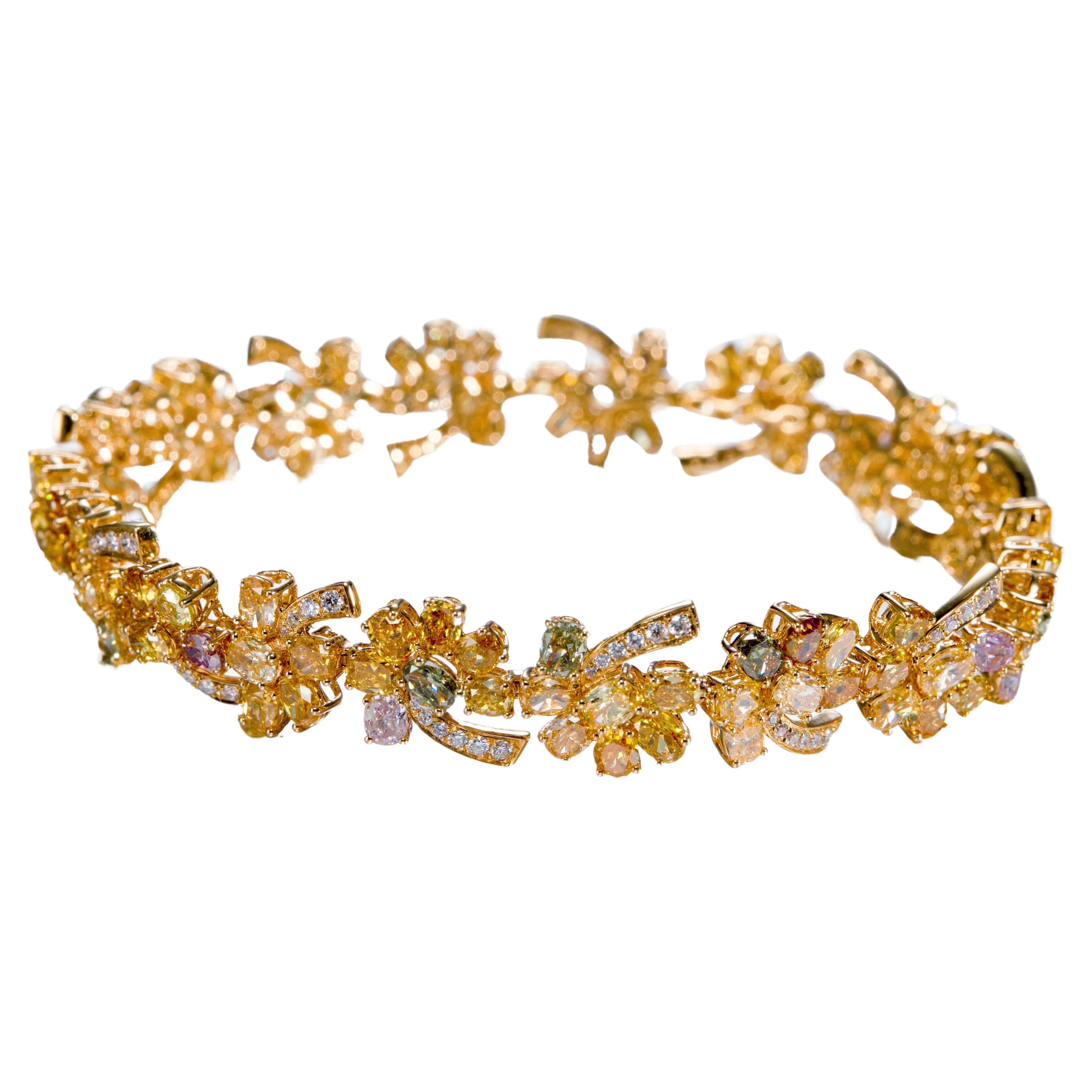 Multi-coloured natural fancy diamond bracelet with mixed shape diamonds in 18KT For Sale