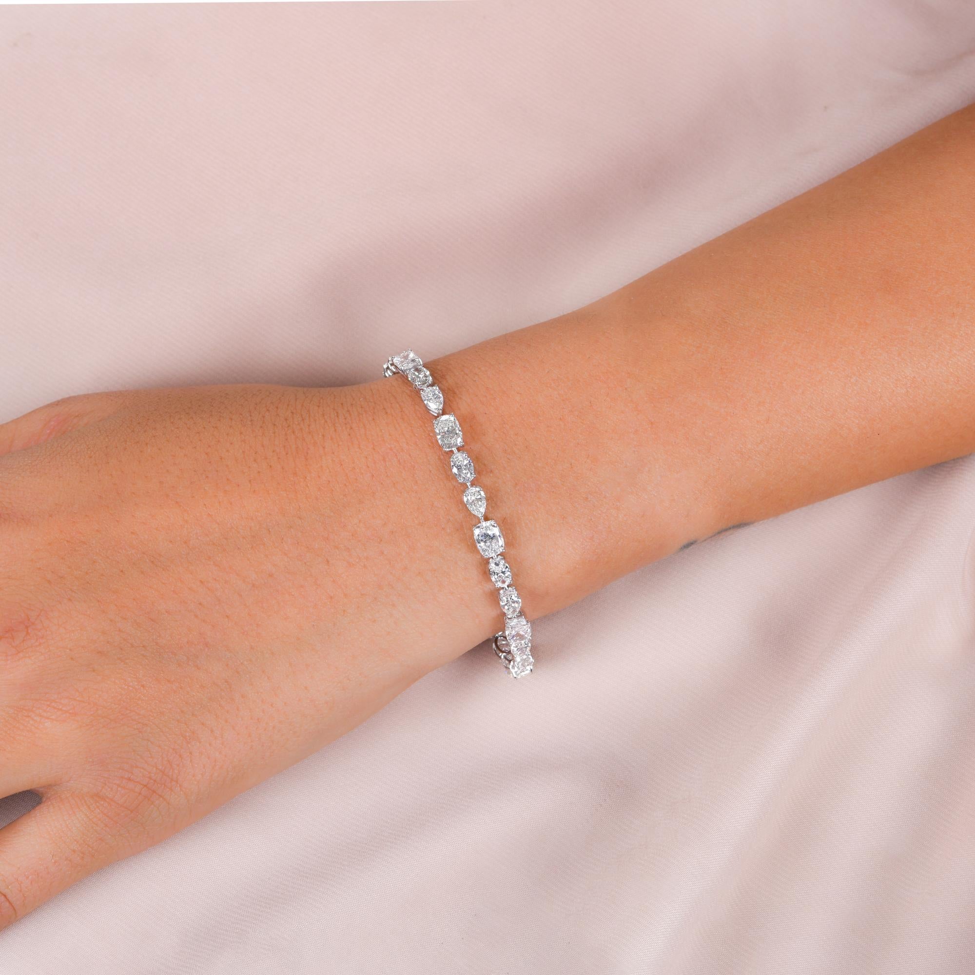 Pulsera de tenis de diamantes naturales talla múltiple 11,13 ct Oro blanco 18k Joyas finas
Esta lujosa pulsera de tenis con diamantes en múltiples formas, está elaborada en oro fino. Su diseño único presenta una secuencia alternada de diamantes