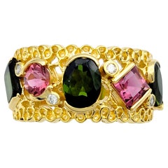 Multi-Cut Pink and Green Tourmaline Wide Band Ring Set in 14 Karat Yellow Gold