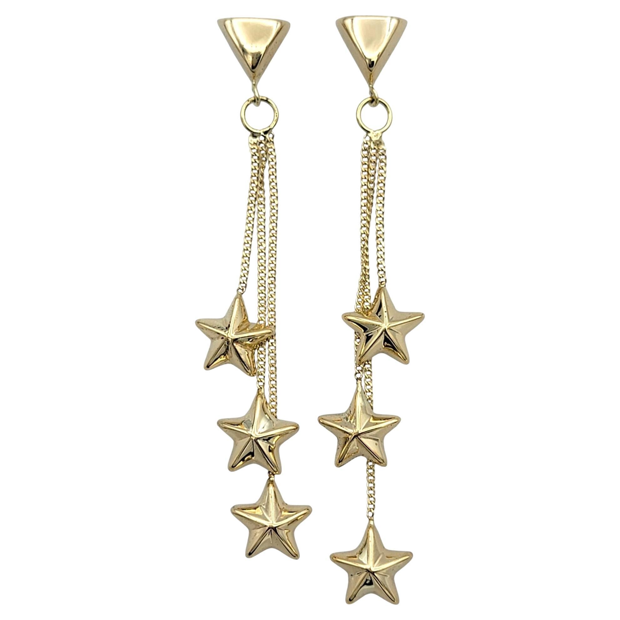 Multi-Dimensional Star Trio Tiered Dangle Earrings in 14 Karat Yellow Gold For Sale