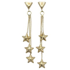 Mehrdimensionaler Stern Trio gestaffelter Ohrring aus 14 Karat Gelbgold