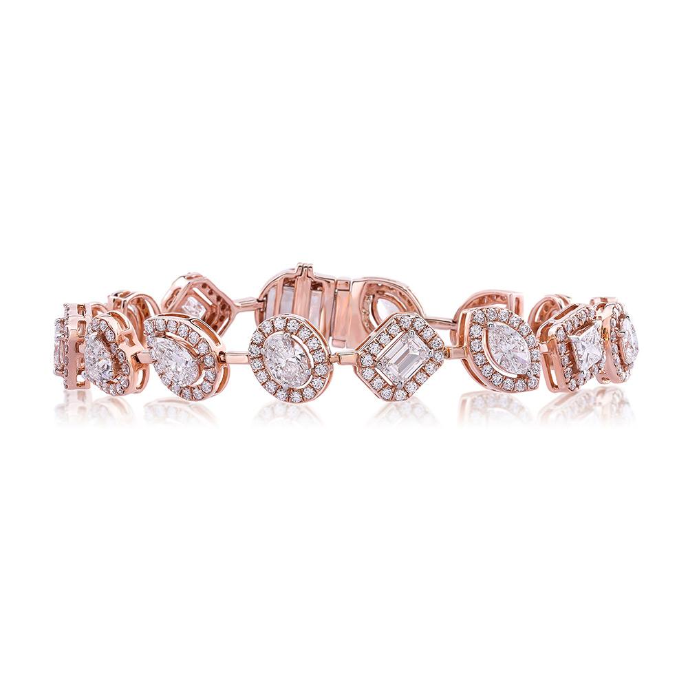 Rendez le quotidien extraordinaire. Serti en or jaune 14 carats et orné de 16 magnifiques diamants de forme fantaisie.

Le bracelet brille grâce aux diamants brillants de taille marquise, poire, émeraude, ovale, cœur et princesse, accentués par un