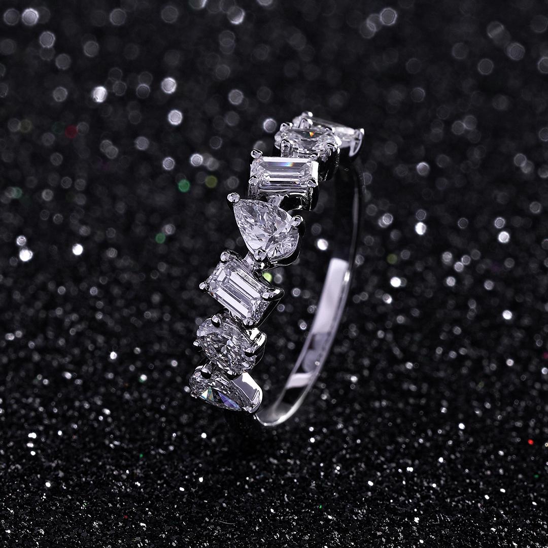 There’s beauty in asymmetry.

Set in 18 kt white gold and decorated with pear, emerald, and oval cut diamonds, our ring blends well with the unconventionalists.

IGI CERTIFIED

Gold- 2.36 gms
Diamond- 0.98 carats
Diamond Colour: E-F
Diamond Clarity: