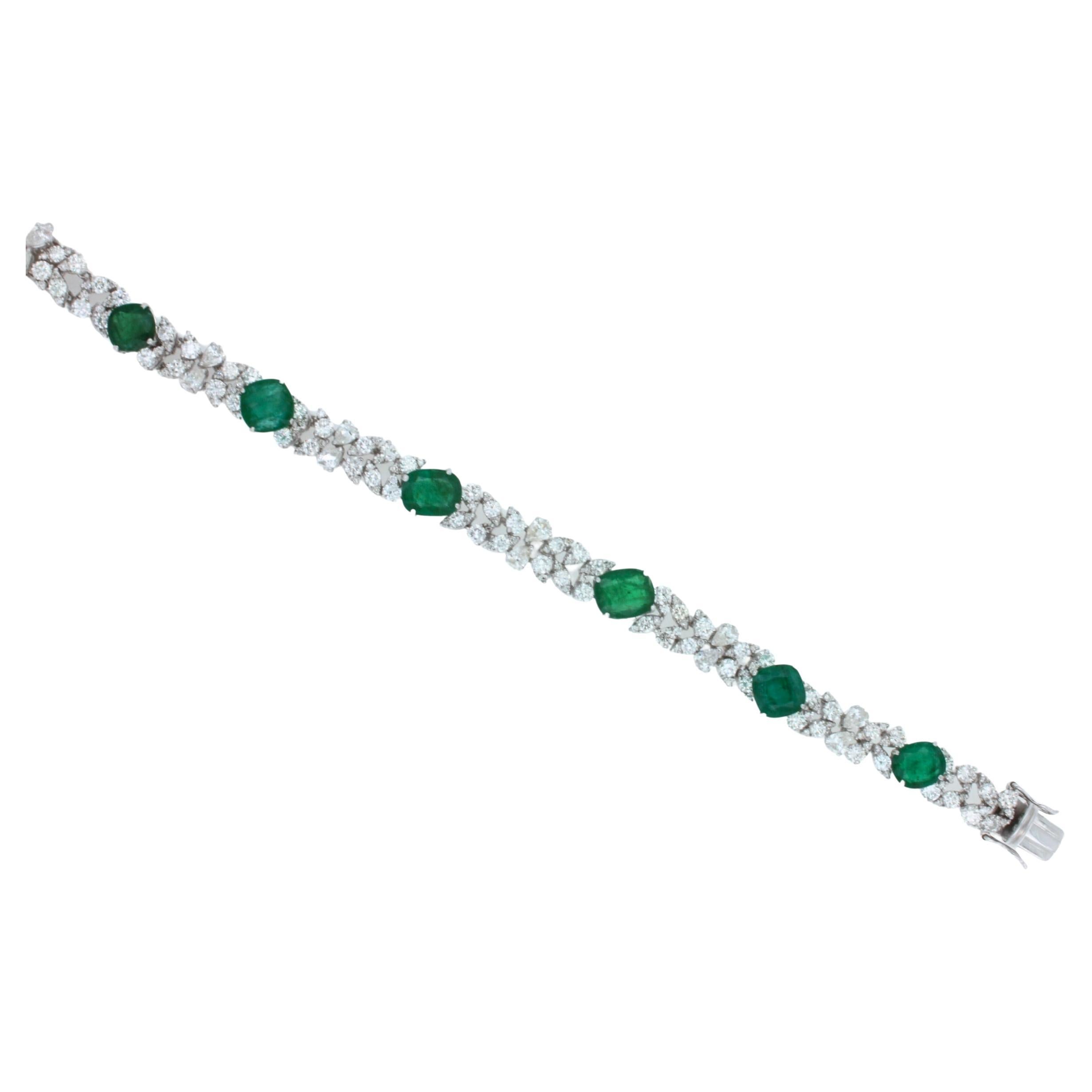 Multi Fancy Shape Green Emerald Diamond 18 Karat White Gold Tennis Bracelet
8.00 Ctw Emeralds with Deep Green & Forest Green Colors/Hues
Very Beautiful & Mystical
6.00 Ctw G/VS Fancy Shape Diamonds
18 Karat White Gold
Length: 7 Inches 
