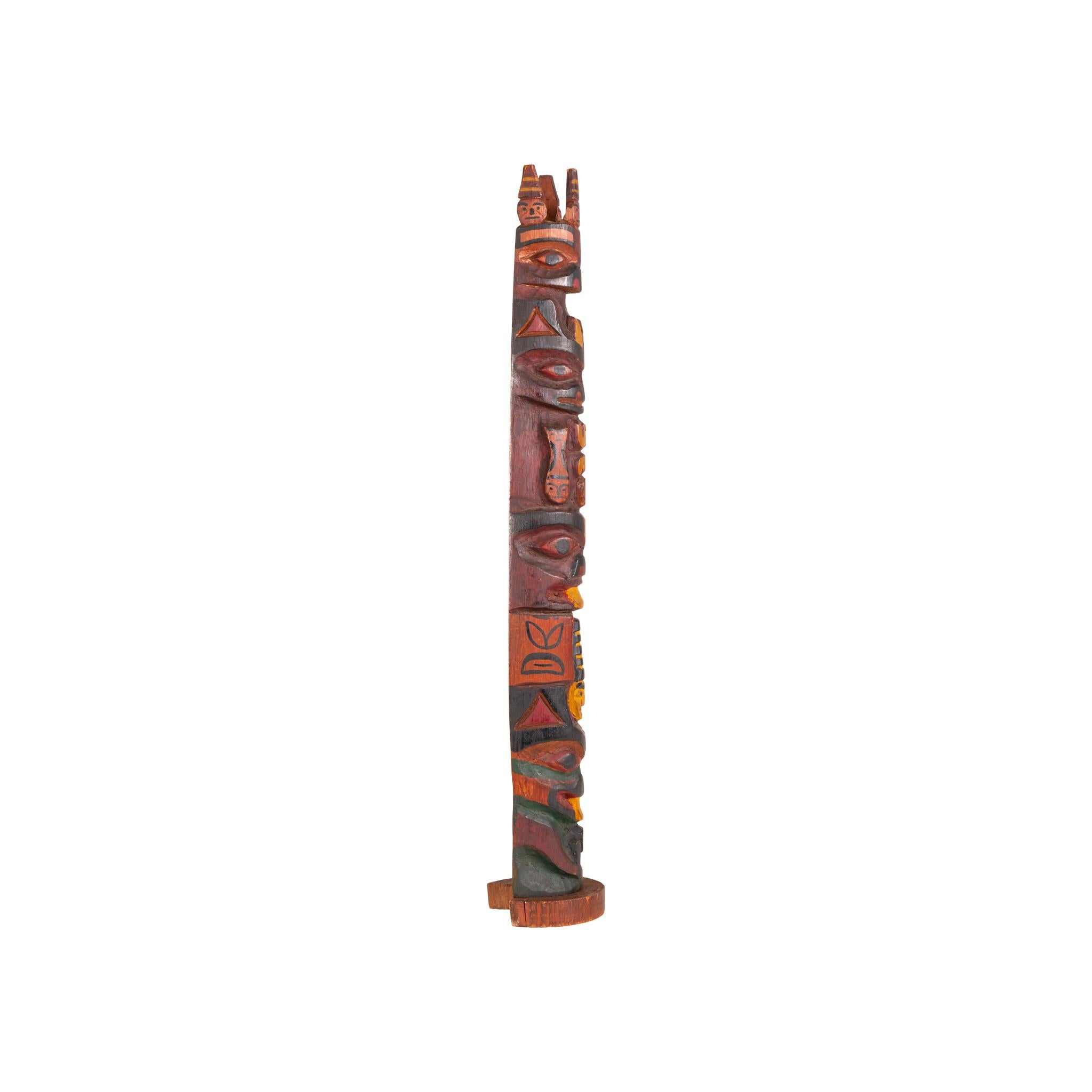 Moses Alexcee was a prolific Tsimshian maker from Prince Rupert who frequently carved for William Webber, the owner of the iconic Thunderbird Scenery Shop in Vancouver, BC. Alexcee often carved Tsimshian-style models of Haida totem poles. Note the