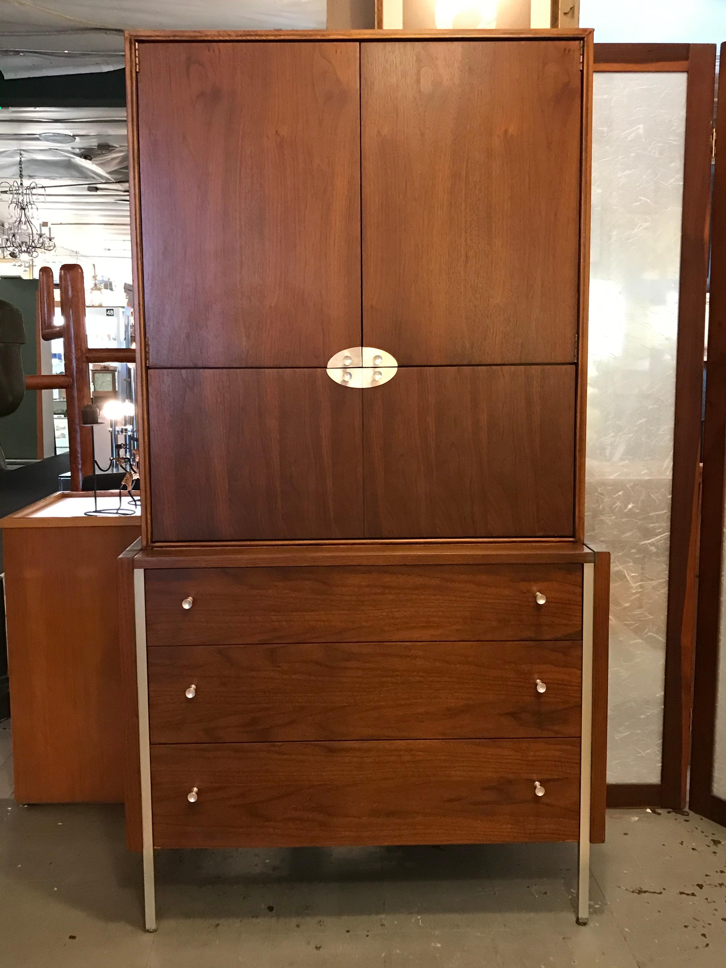 This walnut cabinet secretary can be a bar or a desk.
It also features a dresser on the bottom part and a little cupboard on the top (16.75