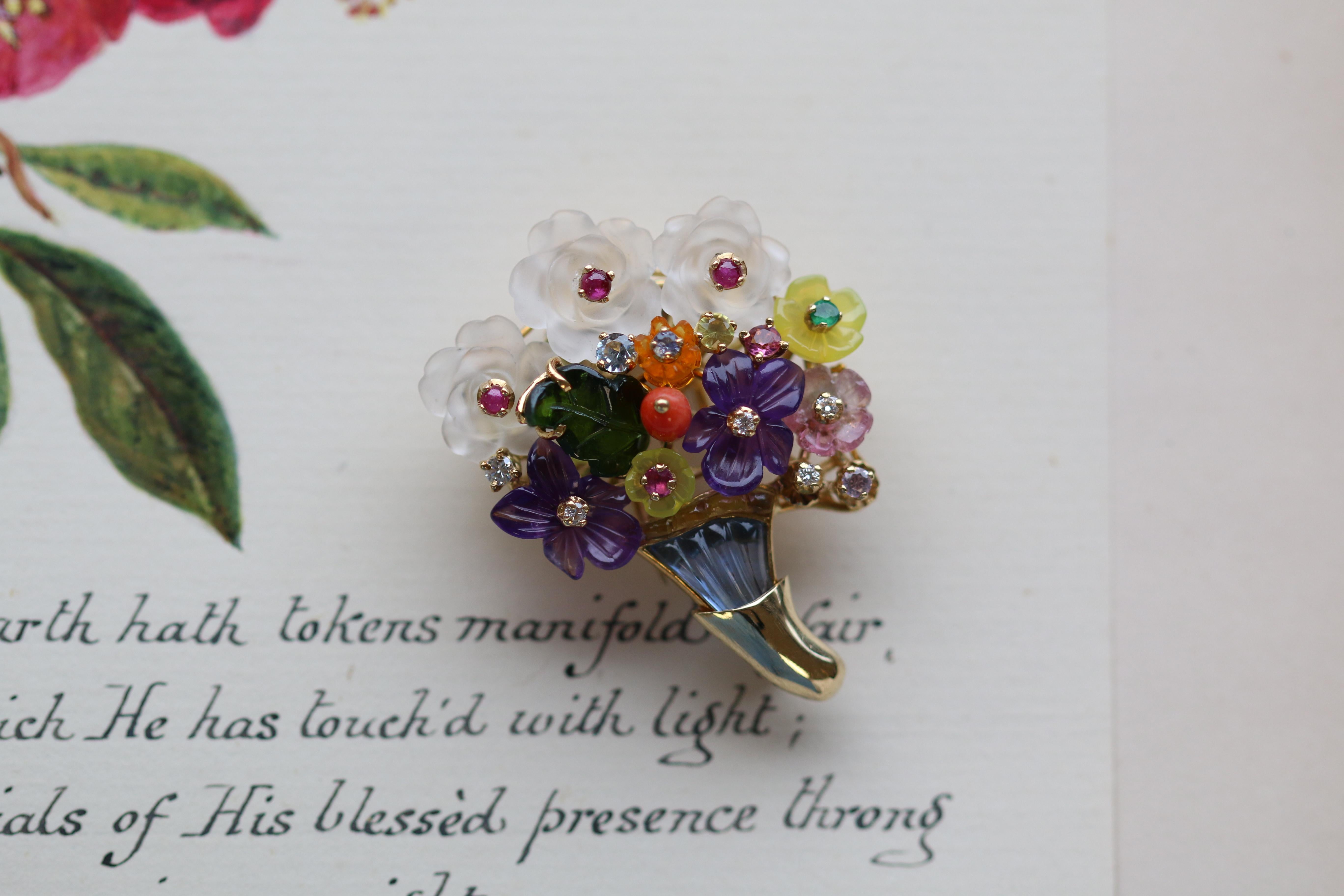 A radiant multi-gem floral brooch bursting with colour and delicate design. A posy of intricate and unique flowers crafted from a variety of gems, from rock crystal, ruby, emerald, and amethyst to coral, peridot, opal, and diamonds. Just some of the