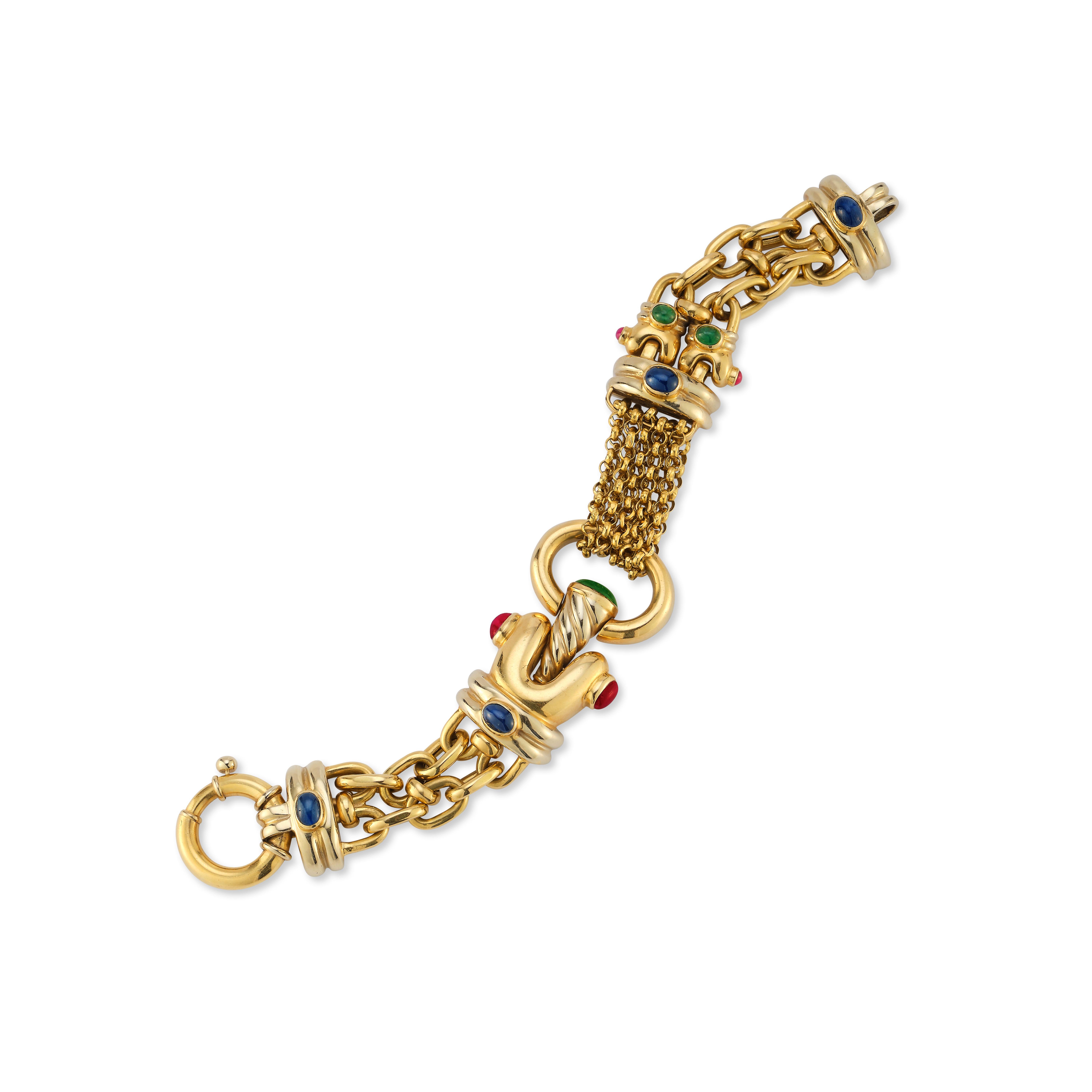 Bracelet à maillons en or et pierres multiples

Une combinaison de divers liens en or avec des saphirs cabochons, des rubis et des émeraudes sertis dans de l'or jaune 18k.

Mesures : 8.5