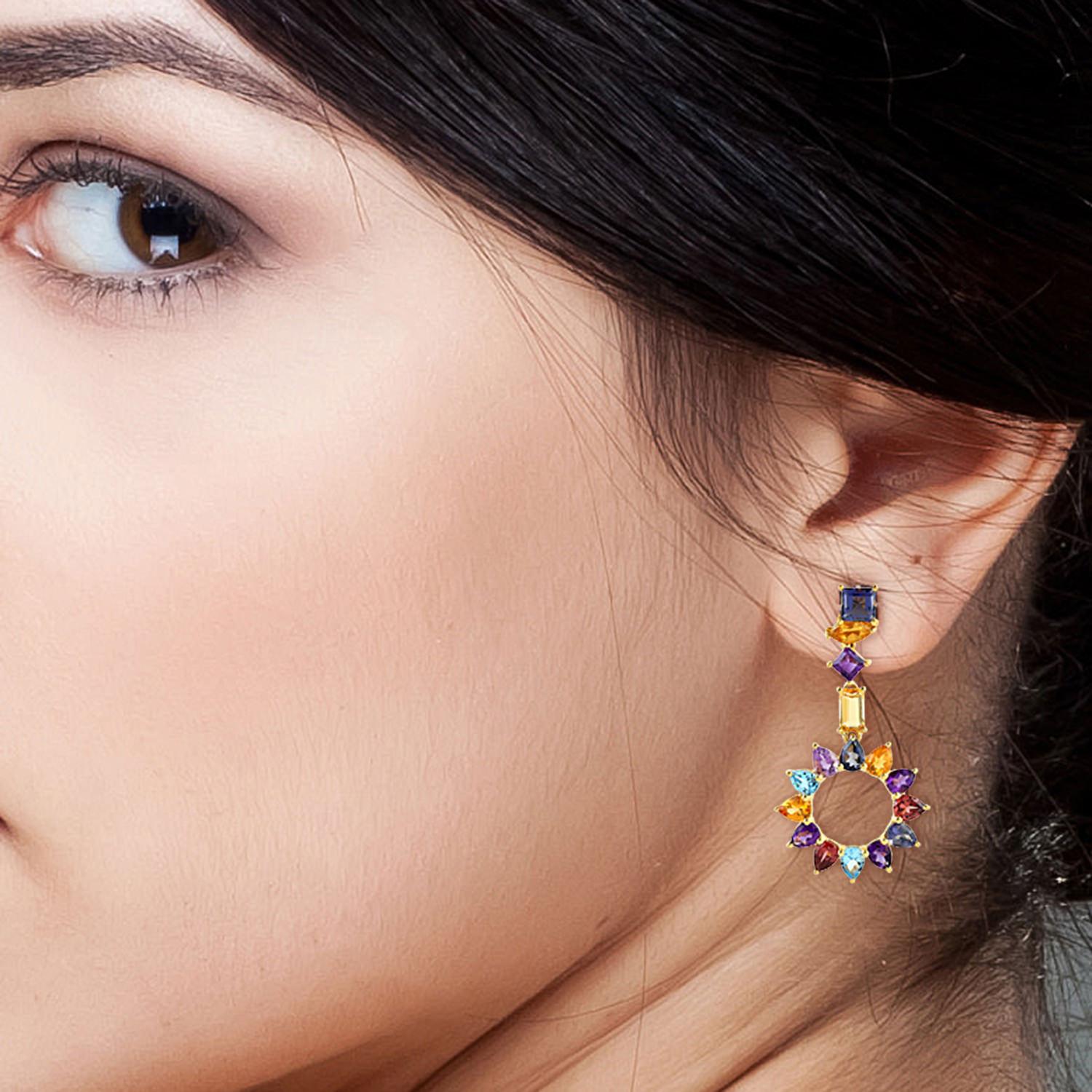 Cast from 18K gold, these multi gemstone earrings are hand set with 1.4 carats Citrine, 1.68 carats Amethyst, 1.75 carats Garnet and 1.75 carats blue topaz.

FOLLOW  MEGHNA JEWELS storefront to view the latest collection & exclusive pieces.  Meghna