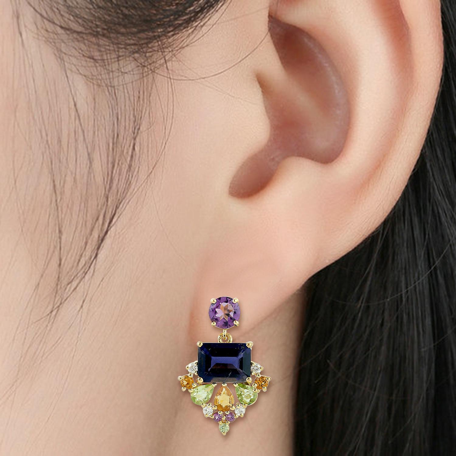 Cast from 18K gold, these beautiful multi gemstone earrings are hand set with .50 carats Citrine, .98 carats Amethyst and .44 carats Iolite.

FOLLOW  MEGHNA JEWELS storefront to view the latest collection & exclusive pieces.  Meghna Jewels is