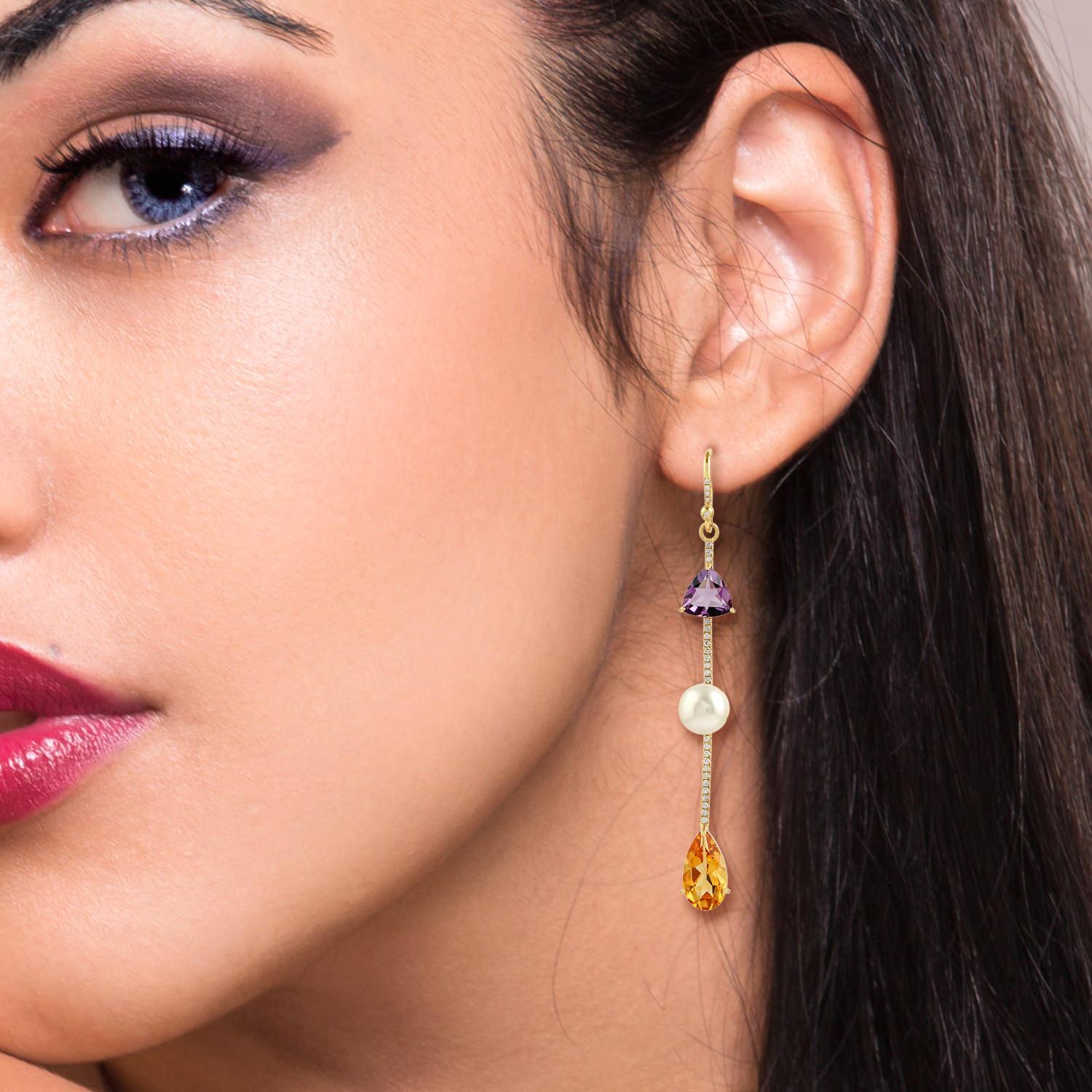 These beautiful linear drop earring are handcrafted in 14-karat gold. It is set with 1.37 carats amethyst, 2.37 carats Citrine, 5.86 carats Pearl and .33 carats of glimmering diamonds.

FOLLOW  MEGHNA JEWELS storefront to view the latest collection