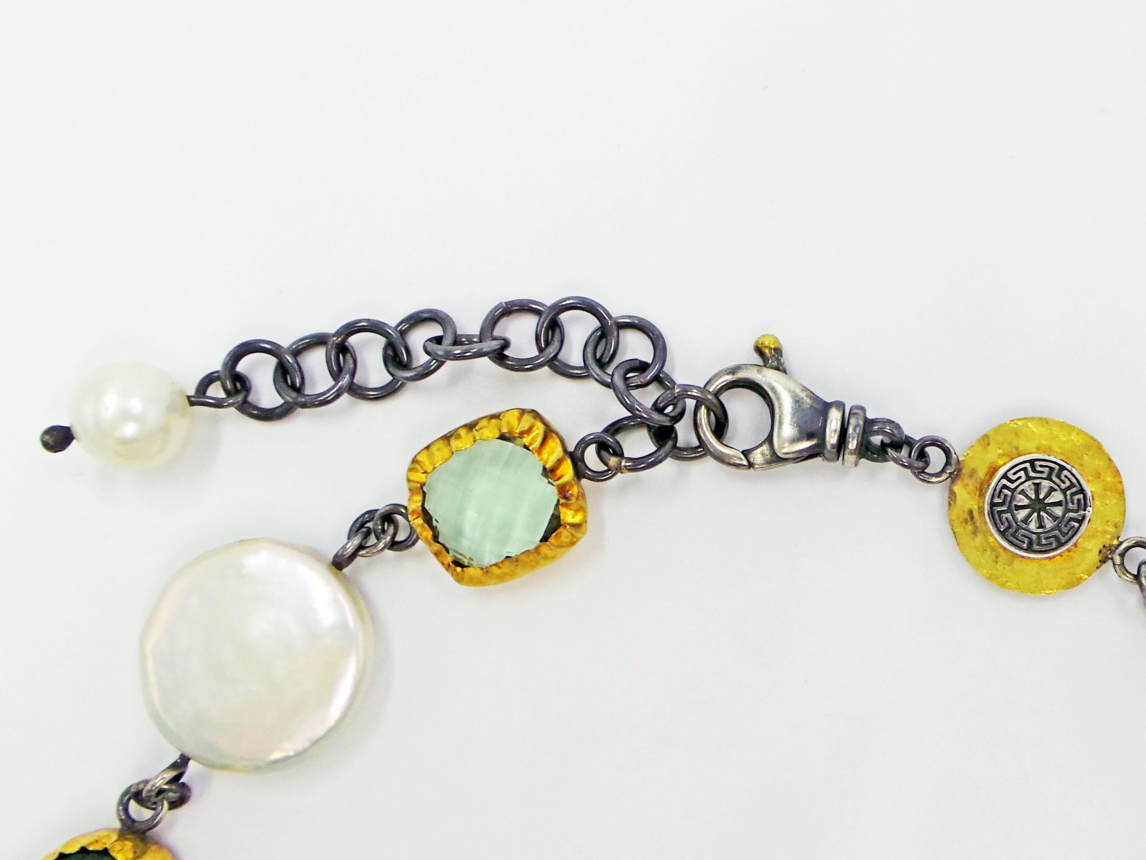 One-of-a-kind Bohemian necklace with a variety of gemstones and ancient coin set in either oxidized sterling silver or 24k yellow gold wrapping. This necklace features Green Amethyst, Freshwater Pearl, Jade, Lapis Lazuli, Australian Opal, Moonstone,