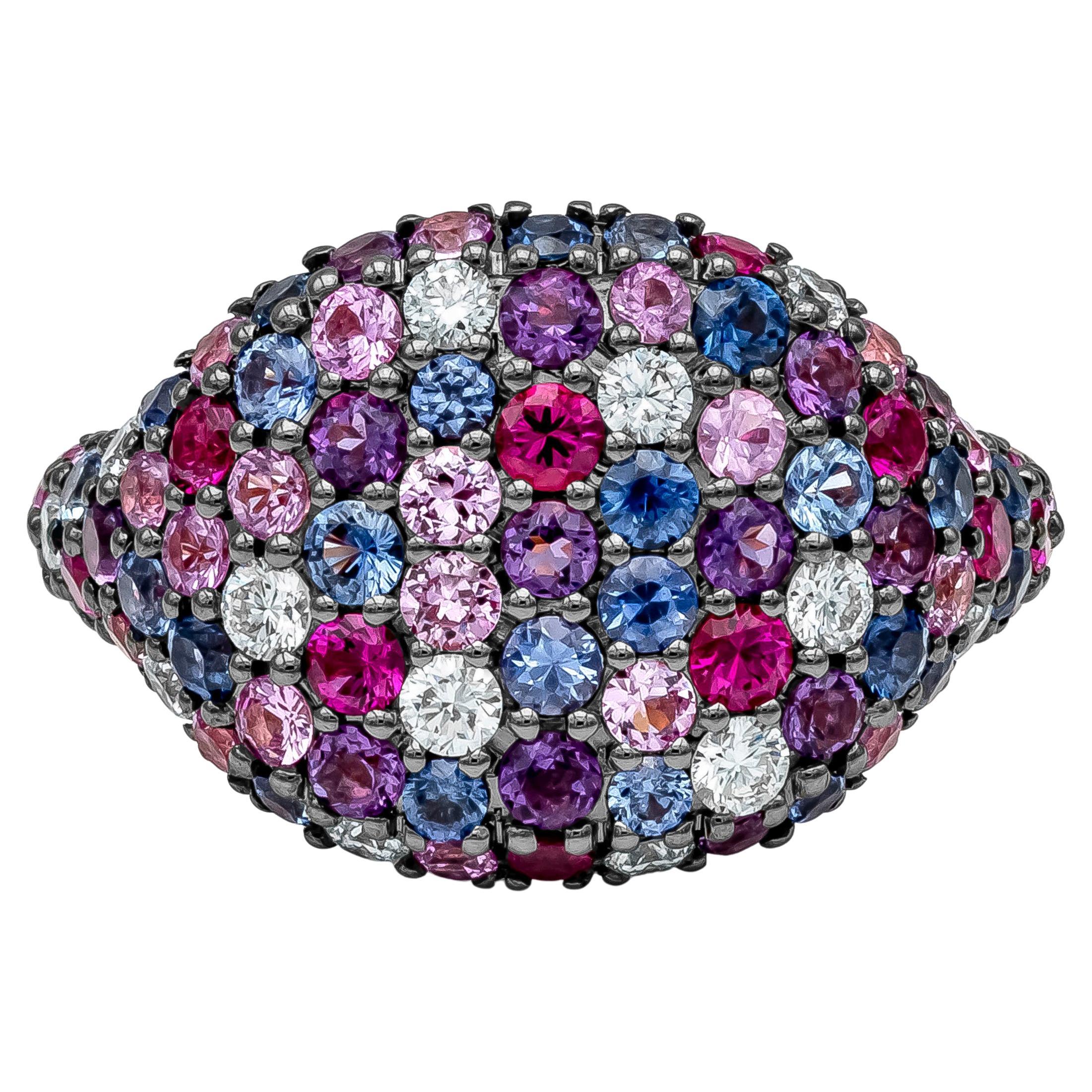 This fashionable and rare style of ring showcasing multi-row of round brilliant gemstone and diamonds set in a rounded and creative design, weighing 3.72 carat total with a cluster of vibrant Amethyst 0.59 carats, Pink Sapphire 0.88 carats, Rubies